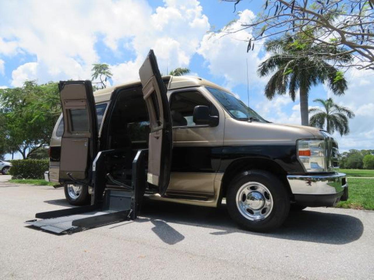 2010 Gold Ford Econoline Wagon E-150 (1FTNE1EL6AD) with an 5.4L V8 SOHC 16V engine, 4-Speed Automatic transmission, located at 4301 Oak Circle #19, Boca Raton, FL, 33431, (954) 561-2499, 26.388861, -80.084038 - You are looking at a Beautiful 2010 Ford Econoline Handicap Wheelchair Converison Van Tuscany VMI Conversion with 48K Original Miles, Ricon Side Entry Wheelchair Lift (the lift is almost brand new), 800lbs Capacity Lift, Raised Side Entry Doors, L Track Ratchet Tie-Downs in the floor, Factory Naviga - Photo#0