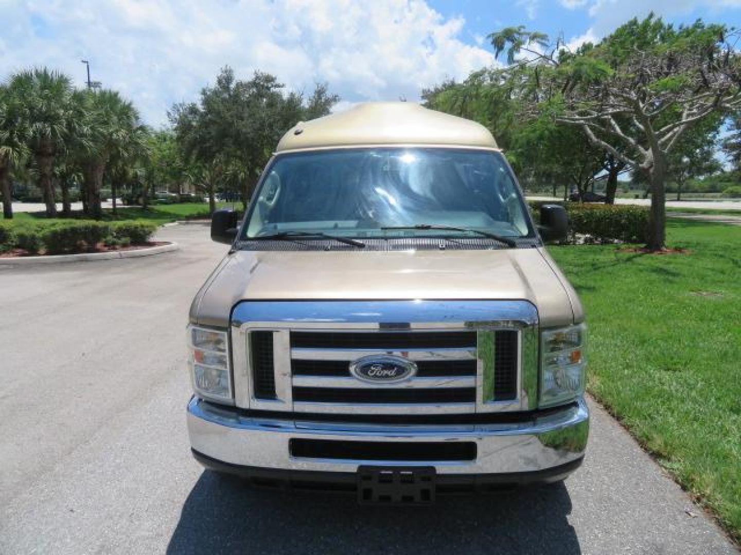 2010 Gold Ford Econoline Wagon E-150 (1FTNE1EL6AD) with an 5.4L V8 SOHC 16V engine, 4-Speed Automatic transmission, located at 4301 Oak Circle #19, Boca Raton, FL, 33431, (954) 561-2499, 26.388861, -80.084038 - You are looking at a Beautiful 2010 Ford Econoline Handicap Wheelchair Converison Van Tuscany VMI Conversion with 48K Original Miles, Ricon Side Entry Wheelchair Lift (the lift is almost brand new), 800lbs Capacity Lift, Raised Side Entry Doors, L Track Ratchet Tie-Downs in the floor, Factory Naviga - Photo#9