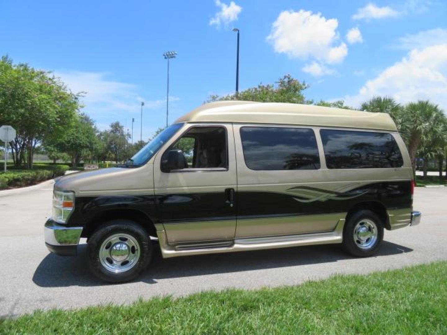 2010 Gold Ford Econoline Wagon E-150 (1FTNE1EL6AD) with an 5.4L V8 SOHC 16V engine, 4-Speed Automatic transmission, located at 4301 Oak Circle #19, Boca Raton, FL, 33431, (954) 561-2499, 26.388861, -80.084038 - You are looking at a Beautiful 2010 Ford Econoline Handicap Wheelchair Converison Van Tuscany VMI Conversion with 48K Original Miles, Ricon Side Entry Wheelchair Lift (the lift is almost brand new), 800lbs Capacity Lift, Raised Side Entry Doors, L Track Ratchet Tie-Downs in the floor, Factory Naviga - Photo#11