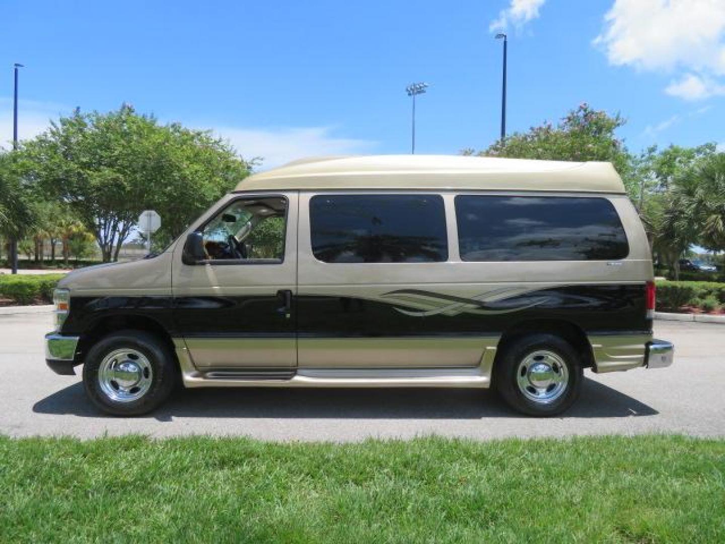 2010 Gold Ford Econoline Wagon E-150 (1FTNE1EL6AD) with an 5.4L V8 SOHC 16V engine, 4-Speed Automatic transmission, located at 4301 Oak Circle #19, Boca Raton, FL, 33431, (954) 561-2499, 26.388861, -80.084038 - You are looking at a Beautiful 2010 Ford Econoline Handicap Wheelchair Converison Van Tuscany VMI Conversion with 48K Original Miles, Ricon Side Entry Wheelchair Lift (the lift is almost brand new), 800lbs Capacity Lift, Raised Side Entry Doors, L Track Ratchet Tie-Downs in the floor, Factory Naviga - Photo#12