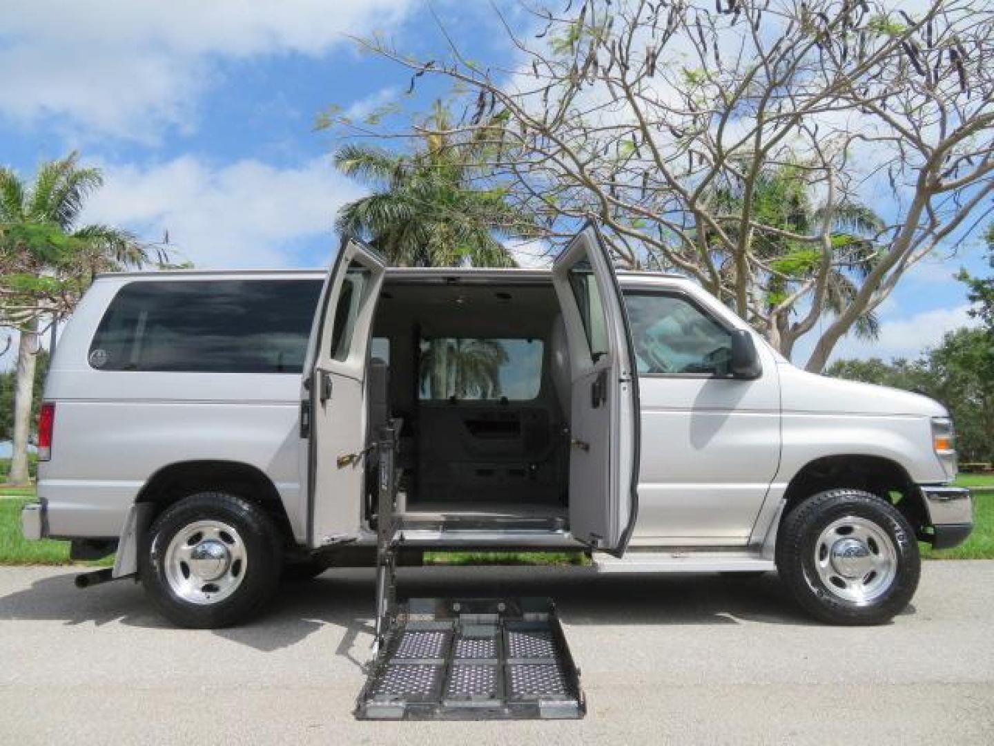 2010 Gold Ford Econoline Wagon E-150 (1FTNE1EL6AD) with an 5.4L V8 SOHC 16V engine, 4-Speed Automatic transmission, located at 4301 Oak Circle #19, Boca Raton, FL, 33431, (954) 561-2499, 26.388861, -80.084038 - You are looking at a Beautiful 2010 Ford Econoline Handicap Wheelchair Converison Van Tuscany VMI Conversion with 48K Original Miles, Ricon Side Entry Wheelchair Lift (the lift is almost brand new), 800lbs Capacity Lift, Raised Side Entry Doors, L Track Ratchet Tie-Downs in the floor, Factory Naviga - Photo#137