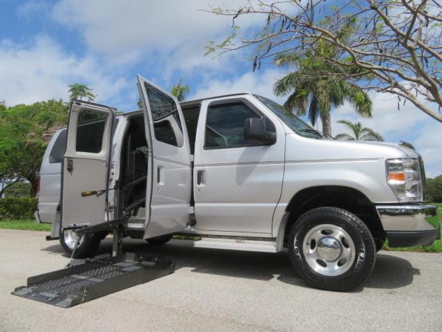 2010 Gold Ford Econoline Wagon E-150 (1FTNE1EL6AD) with an 5.4L V8 SOHC 16V engine, 4-Speed Automatic transmission, located at 4301 Oak Circle #19, Boca Raton, FL, 33431, (954) 561-2499, 26.388861, -80.084038 - You are looking at a Beautiful 2010 Ford Econoline Handicap Wheelchair Converison Van Tuscany VMI Conversion with 48K Original Miles, Ricon Side Entry Wheelchair Lift (the lift is almost brand new), 800lbs Capacity Lift, Raised Side Entry Doors, L Track Ratchet Tie-Downs in the floor, Factory Naviga - Photo#139