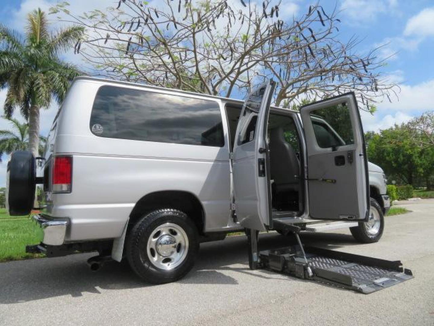 2010 Gold Ford Econoline Wagon E-150 (1FTNE1EL6AD) with an 5.4L V8 SOHC 16V engine, 4-Speed Automatic transmission, located at 4301 Oak Circle #19, Boca Raton, FL, 33431, (954) 561-2499, 26.388861, -80.084038 - You are looking at a Beautiful 2010 Ford Econoline Handicap Wheelchair Converison Van Tuscany VMI Conversion with 48K Original Miles, Ricon Side Entry Wheelchair Lift (the lift is almost brand new), 800lbs Capacity Lift, Raised Side Entry Doors, L Track Ratchet Tie-Downs in the floor, Factory Naviga - Photo#143