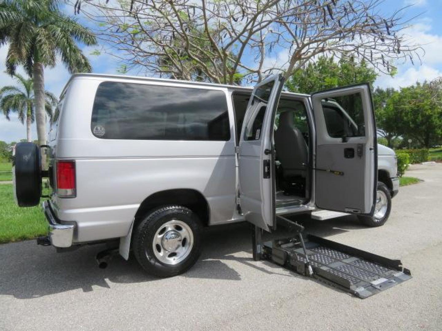 2010 Gold Ford Econoline Wagon E-150 (1FTNE1EL6AD) with an 5.4L V8 SOHC 16V engine, 4-Speed Automatic transmission, located at 4301 Oak Circle #19, Boca Raton, FL, 33431, (954) 561-2499, 26.388861, -80.084038 - You are looking at a Beautiful 2010 Ford Econoline Handicap Wheelchair Converison Van Tuscany VMI Conversion with 48K Original Miles, Ricon Side Entry Wheelchair Lift (the lift is almost brand new), 800lbs Capacity Lift, Raised Side Entry Doors, L Track Ratchet Tie-Downs in the floor, Factory Naviga - Photo#144