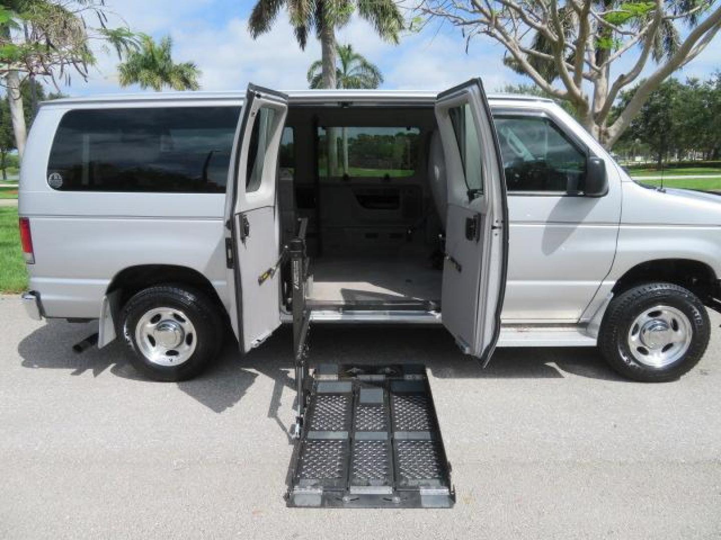 2010 Gold Ford Econoline Wagon E-150 (1FTNE1EL6AD) with an 5.4L V8 SOHC 16V engine, 4-Speed Automatic transmission, located at 4301 Oak Circle #19, Boca Raton, FL, 33431, (954) 561-2499, 26.388861, -80.084038 - You are looking at a Beautiful 2010 Ford Econoline Handicap Wheelchair Converison Van Tuscany VMI Conversion with 48K Original Miles, Ricon Side Entry Wheelchair Lift (the lift is almost brand new), 800lbs Capacity Lift, Raised Side Entry Doors, L Track Ratchet Tie-Downs in the floor, Factory Naviga - Photo#145