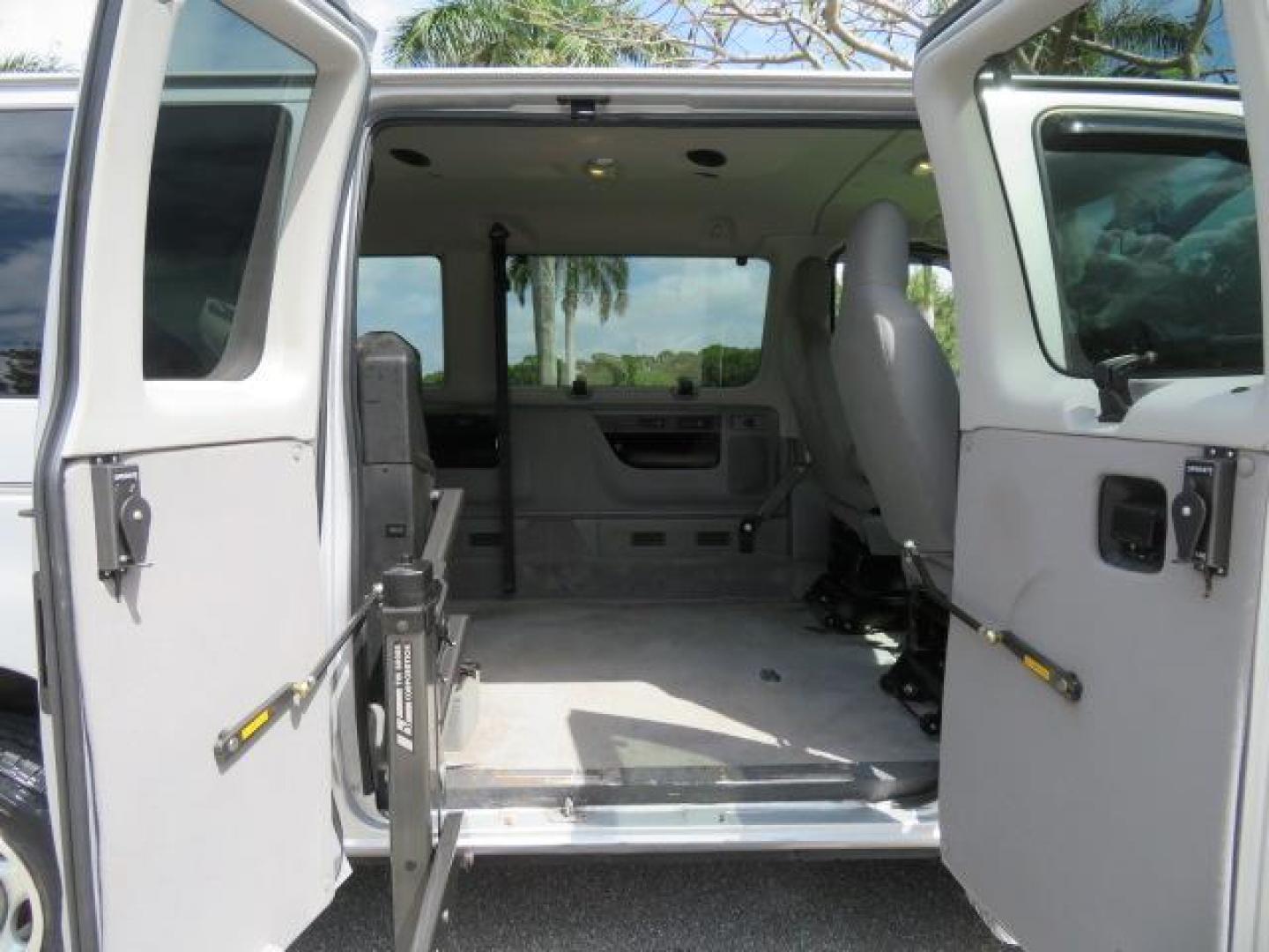 2010 Gold Ford Econoline Wagon E-150 (1FTNE1EL6AD) with an 5.4L V8 SOHC 16V engine, 4-Speed Automatic transmission, located at 4301 Oak Circle #19, Boca Raton, FL, 33431, (954) 561-2499, 26.388861, -80.084038 - You are looking at a Beautiful 2010 Ford Econoline Handicap Wheelchair Converison Van Tuscany VMI Conversion with 48K Original Miles, Ricon Side Entry Wheelchair Lift (the lift is almost brand new), 800lbs Capacity Lift, Raised Side Entry Doors, L Track Ratchet Tie-Downs in the floor, Factory Naviga - Photo#146