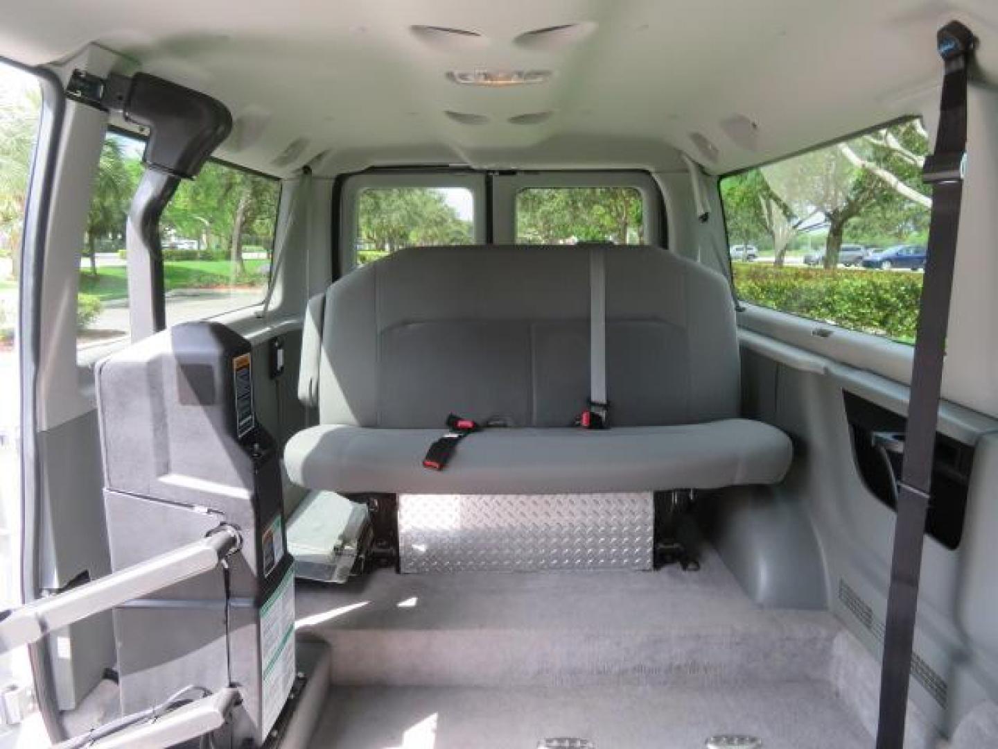 2010 Gold Ford Econoline Wagon E-150 (1FTNE1EL6AD) with an 5.4L V8 SOHC 16V engine, 4-Speed Automatic transmission, located at 4301 Oak Circle #19, Boca Raton, FL, 33431, (954) 561-2499, 26.388861, -80.084038 - You are looking at a Beautiful 2010 Ford Econoline Handicap Wheelchair Converison Van Tuscany VMI Conversion with 48K Original Miles, Ricon Side Entry Wheelchair Lift (the lift is almost brand new), 800lbs Capacity Lift, Raised Side Entry Doors, L Track Ratchet Tie-Downs in the floor, Factory Naviga - Photo#147