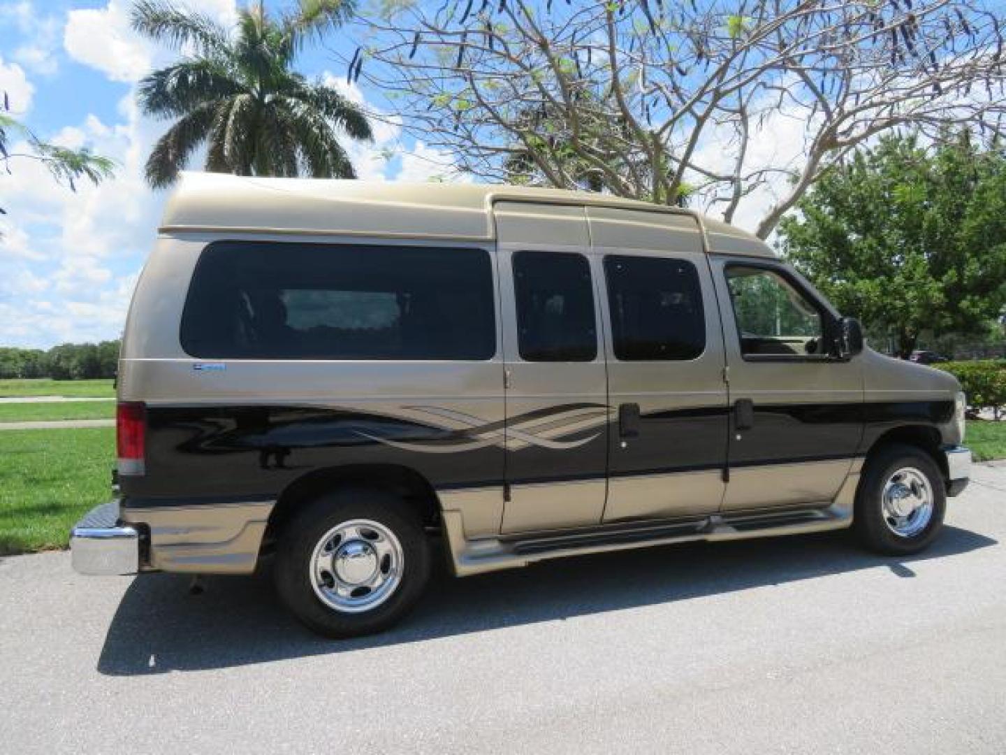 2010 Gold Ford Econoline Wagon E-150 (1FTNE1EL6AD) with an 5.4L V8 SOHC 16V engine, 4-Speed Automatic transmission, located at 4301 Oak Circle #19, Boca Raton, FL, 33431, (954) 561-2499, 26.388861, -80.084038 - You are looking at a Beautiful 2010 Ford Econoline Handicap Wheelchair Converison Van Tuscany VMI Conversion with 48K Original Miles, Ricon Side Entry Wheelchair Lift (the lift is almost brand new), 800lbs Capacity Lift, Raised Side Entry Doors, L Track Ratchet Tie-Downs in the floor, Factory Naviga - Photo#16