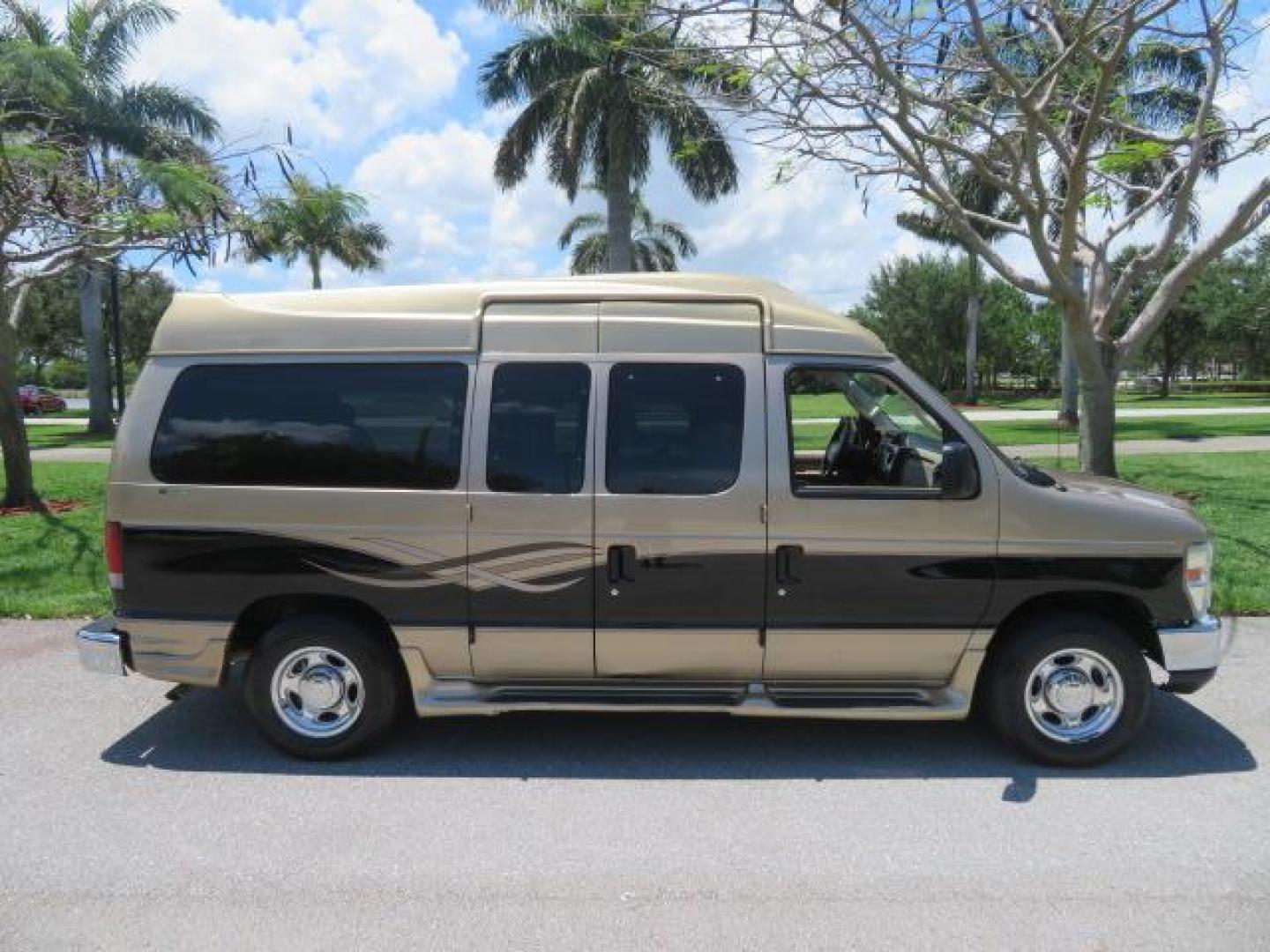 2010 Gold Ford Econoline Wagon E-150 (1FTNE1EL6AD) with an 5.4L V8 SOHC 16V engine, 4-Speed Automatic transmission, located at 4301 Oak Circle #19, Boca Raton, FL, 33431, (954) 561-2499, 26.388861, -80.084038 - You are looking at a Beautiful 2010 Ford Econoline Handicap Wheelchair Converison Van Tuscany VMI Conversion with 48K Original Miles, Ricon Side Entry Wheelchair Lift (the lift is almost brand new), 800lbs Capacity Lift, Raised Side Entry Doors, L Track Ratchet Tie-Downs in the floor, Factory Naviga - Photo#19