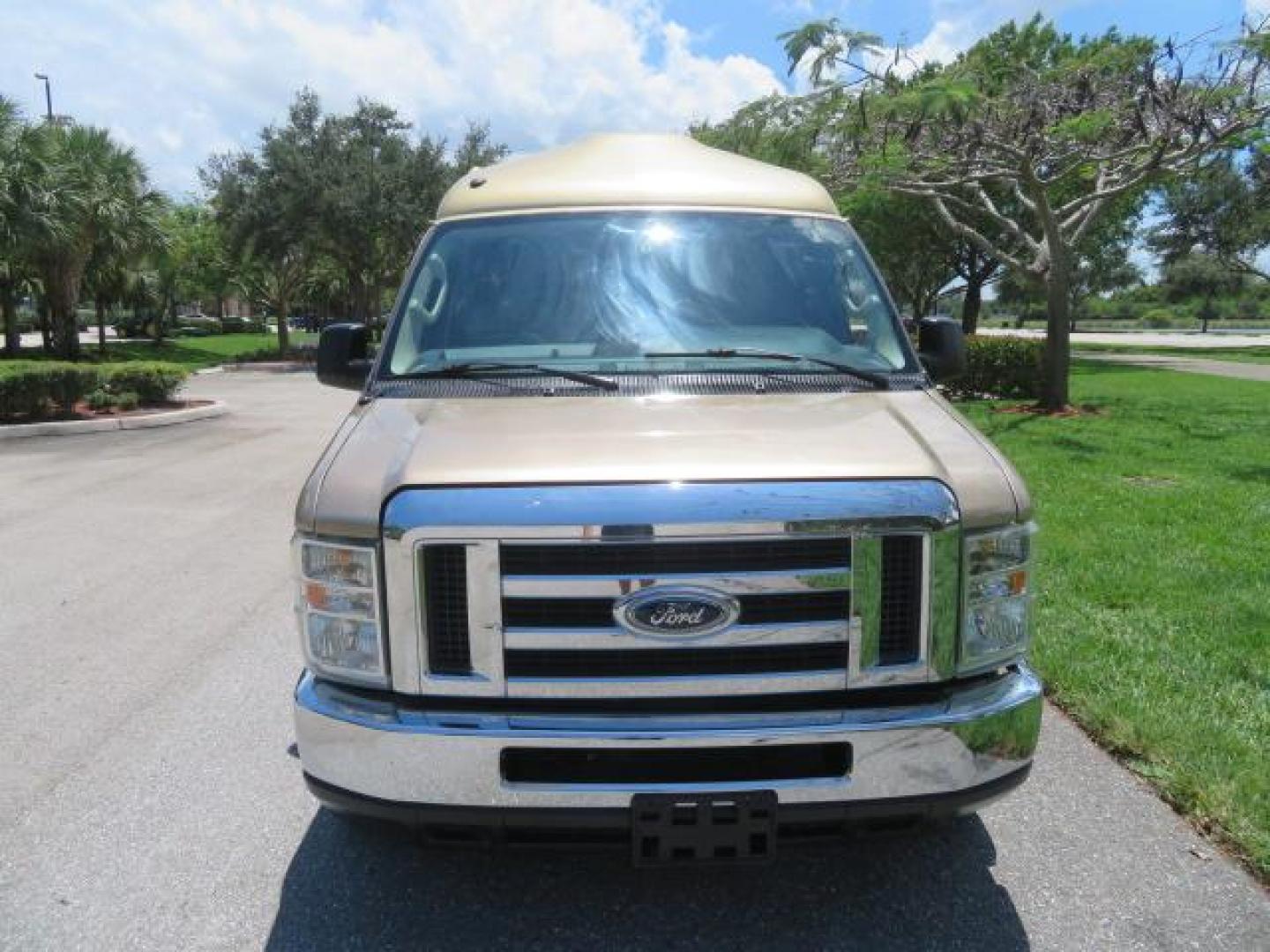 2010 Gold Ford Econoline Wagon E-150 (1FTNE1EL6AD) with an 5.4L V8 SOHC 16V engine, 4-Speed Automatic transmission, located at 4301 Oak Circle #19, Boca Raton, FL, 33431, (954) 561-2499, 26.388861, -80.084038 - You are looking at a Beautiful 2010 Ford Econoline Handicap Wheelchair Converison Van Tuscany VMI Conversion with 48K Original Miles, Ricon Side Entry Wheelchair Lift (the lift is almost brand new), 800lbs Capacity Lift, Raised Side Entry Doors, L Track Ratchet Tie-Downs in the floor, Factory Naviga - Photo#21