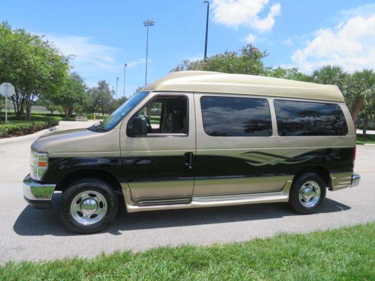 2010 Gold Ford Econoline Wagon E-150 (1FTNE1EL6AD) with an 5.4L V8 SOHC 16V engine, 4-Speed Automatic transmission, located at 4301 Oak Circle #19, Boca Raton, FL, 33431, (954) 561-2499, 26.388861, -80.084038 - You are looking at a Beautiful 2010 Ford Econoline Handicap Wheelchair Converison Van Tuscany VMI Conversion with 48K Original Miles, Ricon Side Entry Wheelchair Lift (the lift is almost brand new), 800lbs Capacity Lift, Raised Side Entry Doors, L Track Ratchet Tie-Downs in the floor, Factory Naviga - Photo#23