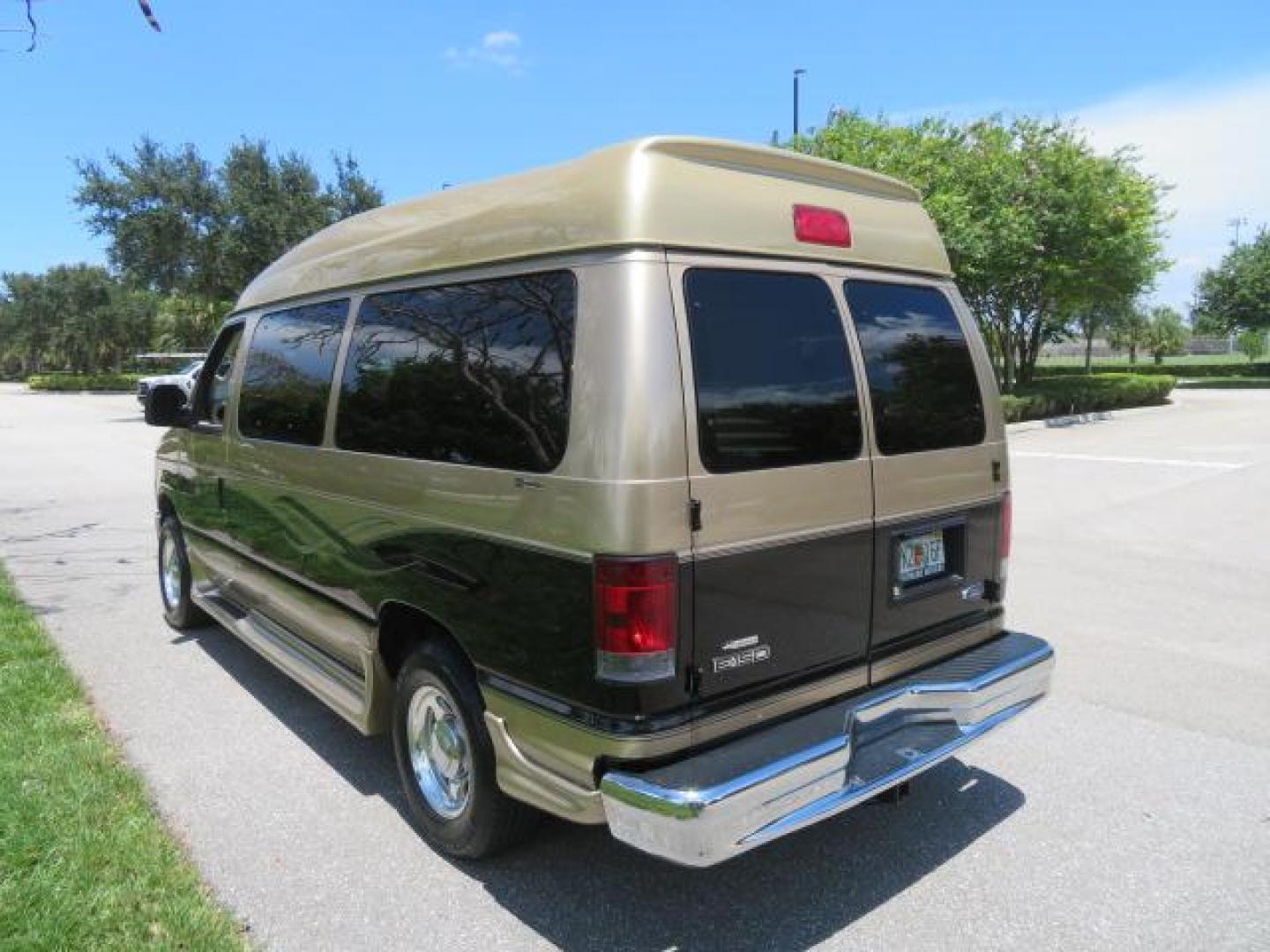 2010 Gold Ford Econoline Wagon E-150 (1FTNE1EL6AD) with an 5.4L V8 SOHC 16V engine, 4-Speed Automatic transmission, located at 4301 Oak Circle #19, Boca Raton, FL, 33431, (954) 561-2499, 26.388861, -80.084038 - You are looking at a Beautiful 2010 Ford Econoline Handicap Wheelchair Converison Van Tuscany VMI Conversion with 48K Original Miles, Ricon Side Entry Wheelchair Lift (the lift is almost brand new), 800lbs Capacity Lift, Raised Side Entry Doors, L Track Ratchet Tie-Downs in the floor, Factory Naviga - Photo#25