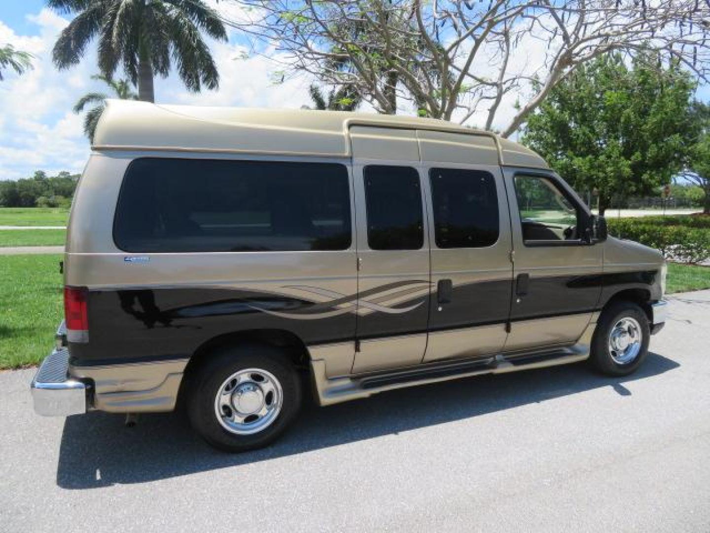 2010 Gold Ford Econoline Wagon E-150 (1FTNE1EL6AD) with an 5.4L V8 SOHC 16V engine, 4-Speed Automatic transmission, located at 4301 Oak Circle #19, Boca Raton, FL, 33431, (954) 561-2499, 26.388861, -80.084038 - You are looking at a Beautiful 2010 Ford Econoline Handicap Wheelchair Converison Van Tuscany VMI Conversion with 48K Original Miles, Ricon Side Entry Wheelchair Lift (the lift is almost brand new), 800lbs Capacity Lift, Raised Side Entry Doors, L Track Ratchet Tie-Downs in the floor, Factory Naviga - Photo#28