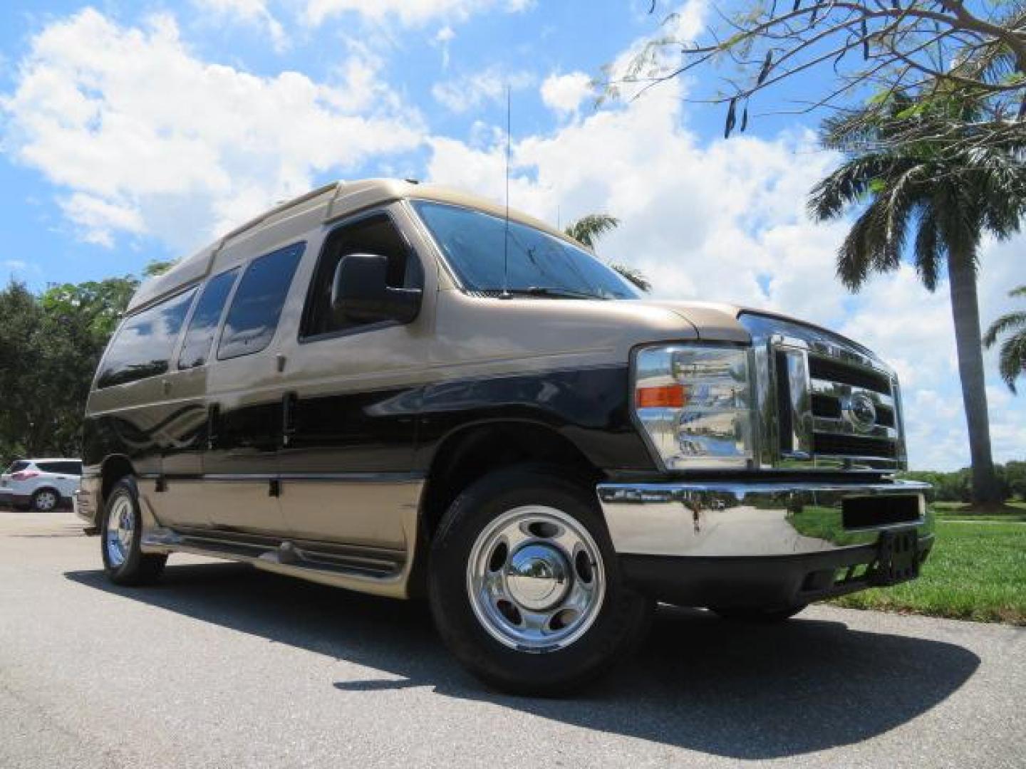 2010 Gold Ford Econoline Wagon E-150 (1FTNE1EL6AD) with an 5.4L V8 SOHC 16V engine, 4-Speed Automatic transmission, located at 4301 Oak Circle #19, Boca Raton, FL, 33431, (954) 561-2499, 26.388861, -80.084038 - You are looking at a Beautiful 2010 Ford Econoline Handicap Wheelchair Converison Van Tuscany VMI Conversion with 48K Original Miles, Ricon Side Entry Wheelchair Lift (the lift is almost brand new), 800lbs Capacity Lift, Raised Side Entry Doors, L Track Ratchet Tie-Downs in the floor, Factory Naviga - Photo#2