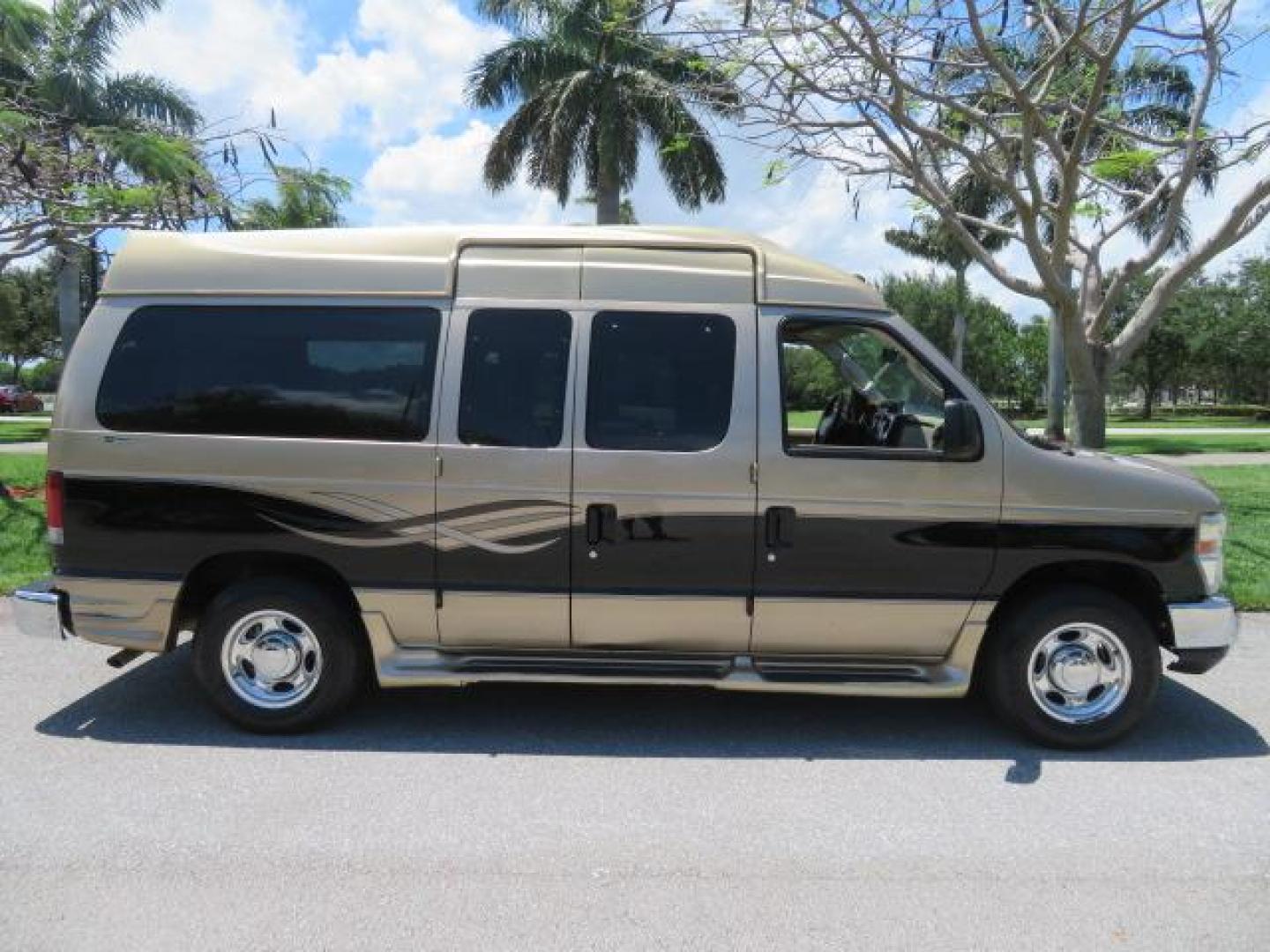 2010 Gold Ford Econoline Wagon E-150 (1FTNE1EL6AD) with an 5.4L V8 SOHC 16V engine, 4-Speed Automatic transmission, located at 4301 Oak Circle #19, Boca Raton, FL, 33431, (954) 561-2499, 26.388861, -80.084038 - You are looking at a Beautiful 2010 Ford Econoline Handicap Wheelchair Converison Van Tuscany VMI Conversion with 48K Original Miles, Ricon Side Entry Wheelchair Lift (the lift is almost brand new), 800lbs Capacity Lift, Raised Side Entry Doors, L Track Ratchet Tie-Downs in the floor, Factory Naviga - Photo#29