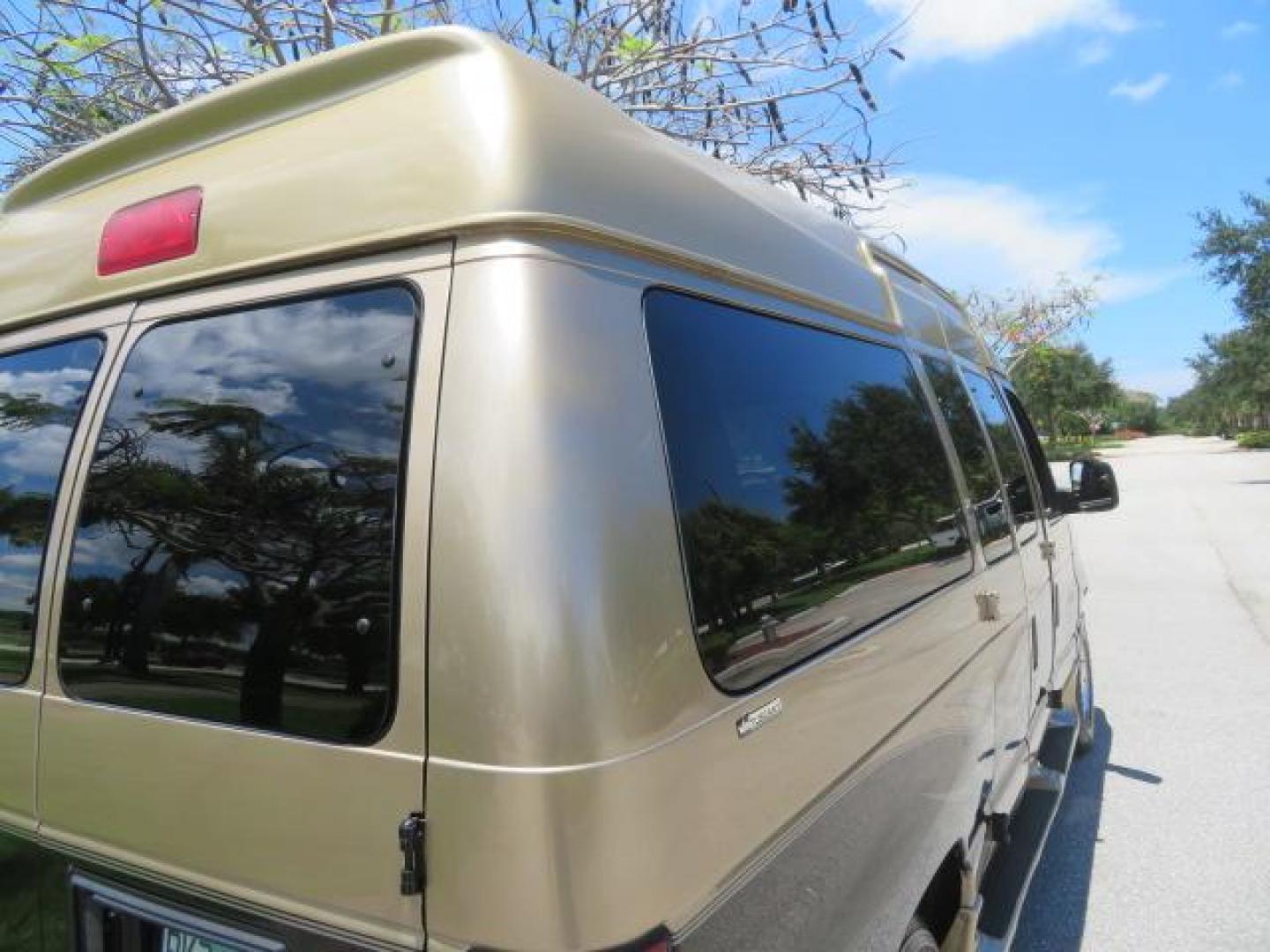 2010 Gold Ford Econoline Wagon E-150 (1FTNE1EL6AD) with an 5.4L V8 SOHC 16V engine, 4-Speed Automatic transmission, located at 4301 Oak Circle #19, Boca Raton, FL, 33431, (954) 561-2499, 26.388861, -80.084038 - You are looking at a Beautiful 2010 Ford Econoline Handicap Wheelchair Converison Van Tuscany VMI Conversion with 48K Original Miles, Ricon Side Entry Wheelchair Lift (the lift is almost brand new), 800lbs Capacity Lift, Raised Side Entry Doors, L Track Ratchet Tie-Downs in the floor, Factory Naviga - Photo#34