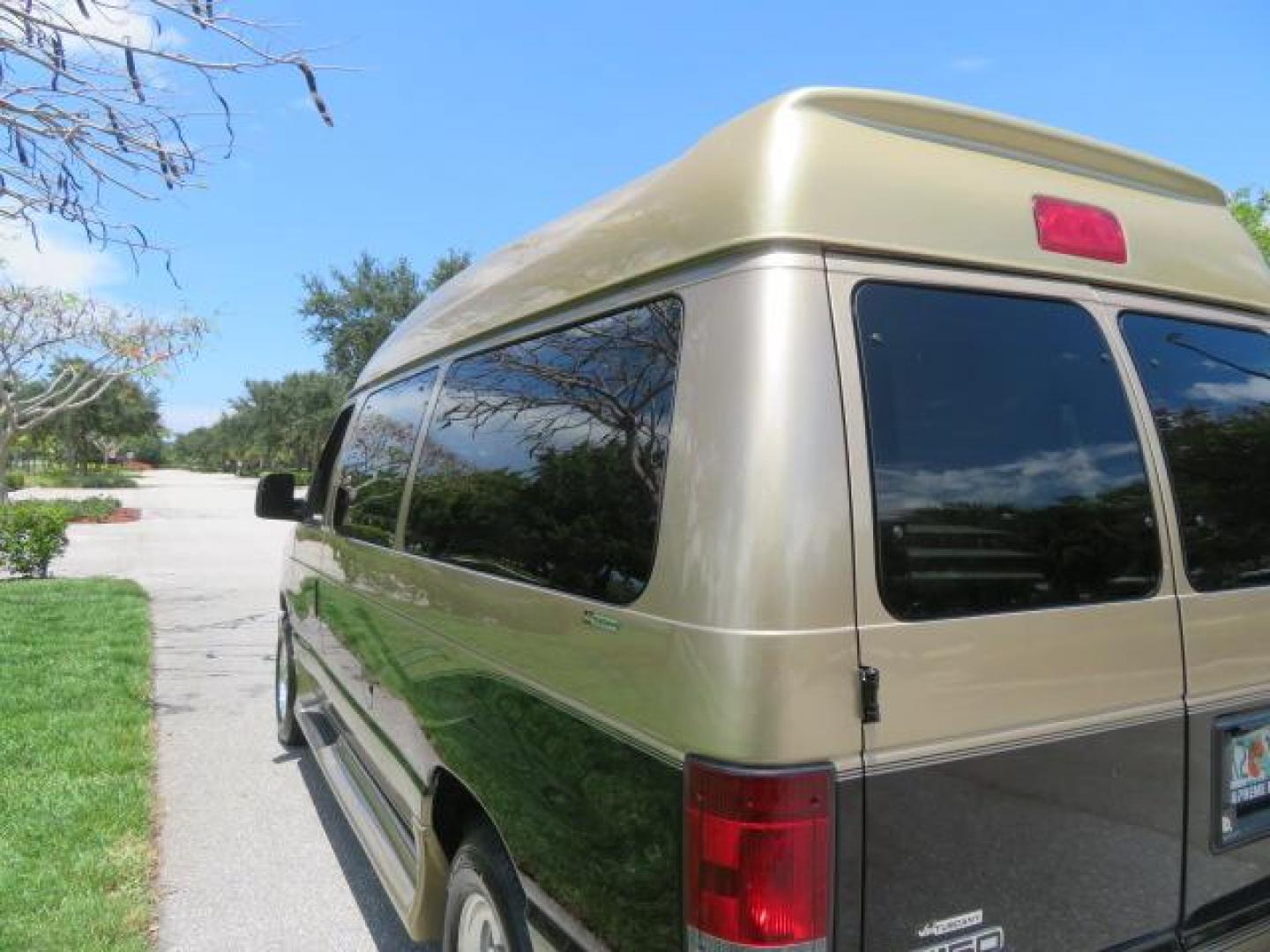 2010 Gold Ford Econoline Wagon E-150 (1FTNE1EL6AD) with an 5.4L V8 SOHC 16V engine, 4-Speed Automatic transmission, located at 4301 Oak Circle #19, Boca Raton, FL, 33431, (954) 561-2499, 26.388861, -80.084038 - You are looking at a Beautiful 2010 Ford Econoline Handicap Wheelchair Converison Van Tuscany VMI Conversion with 48K Original Miles, Ricon Side Entry Wheelchair Lift (the lift is almost brand new), 800lbs Capacity Lift, Raised Side Entry Doors, L Track Ratchet Tie-Downs in the floor, Factory Naviga - Photo#37