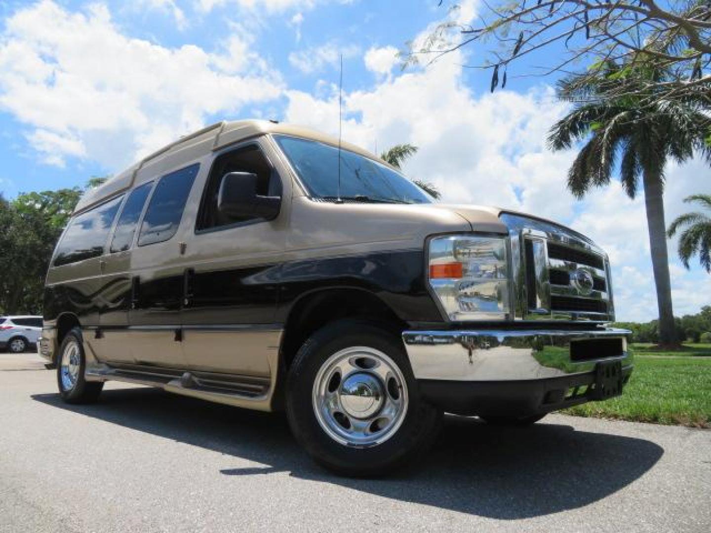 2010 Gold Ford Econoline Wagon E-150 (1FTNE1EL6AD) with an 5.4L V8 SOHC 16V engine, 4-Speed Automatic transmission, located at 4301 Oak Circle #19, Boca Raton, FL, 33431, (954) 561-2499, 26.388861, -80.084038 - You are looking at a Beautiful 2010 Ford Econoline Handicap Wheelchair Converison Van Tuscany VMI Conversion with 48K Original Miles, Ricon Side Entry Wheelchair Lift (the lift is almost brand new), 800lbs Capacity Lift, Raised Side Entry Doors, L Track Ratchet Tie-Downs in the floor, Factory Naviga - Photo#3