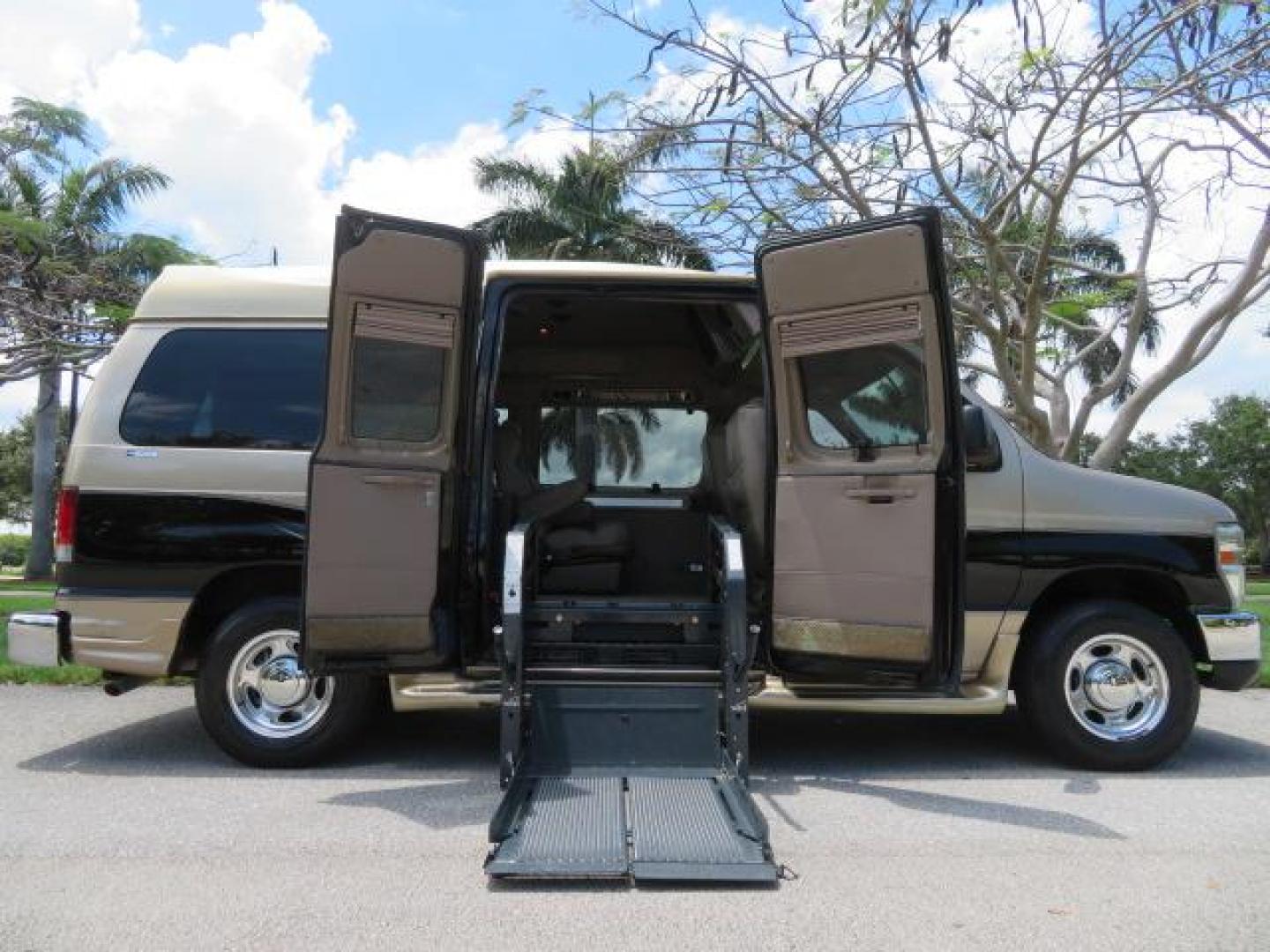 2010 Gold Ford Econoline Wagon E-150 (1FTNE1EL6AD) with an 5.4L V8 SOHC 16V engine, 4-Speed Automatic transmission, located at 4301 Oak Circle #19, Boca Raton, FL, 33431, (954) 561-2499, 26.388861, -80.084038 - You are looking at a Beautiful 2010 Ford Econoline Handicap Wheelchair Converison Van Tuscany VMI Conversion with 48K Original Miles, Ricon Side Entry Wheelchair Lift (the lift is almost brand new), 800lbs Capacity Lift, Raised Side Entry Doors, L Track Ratchet Tie-Downs in the floor, Factory Naviga - Photo#44