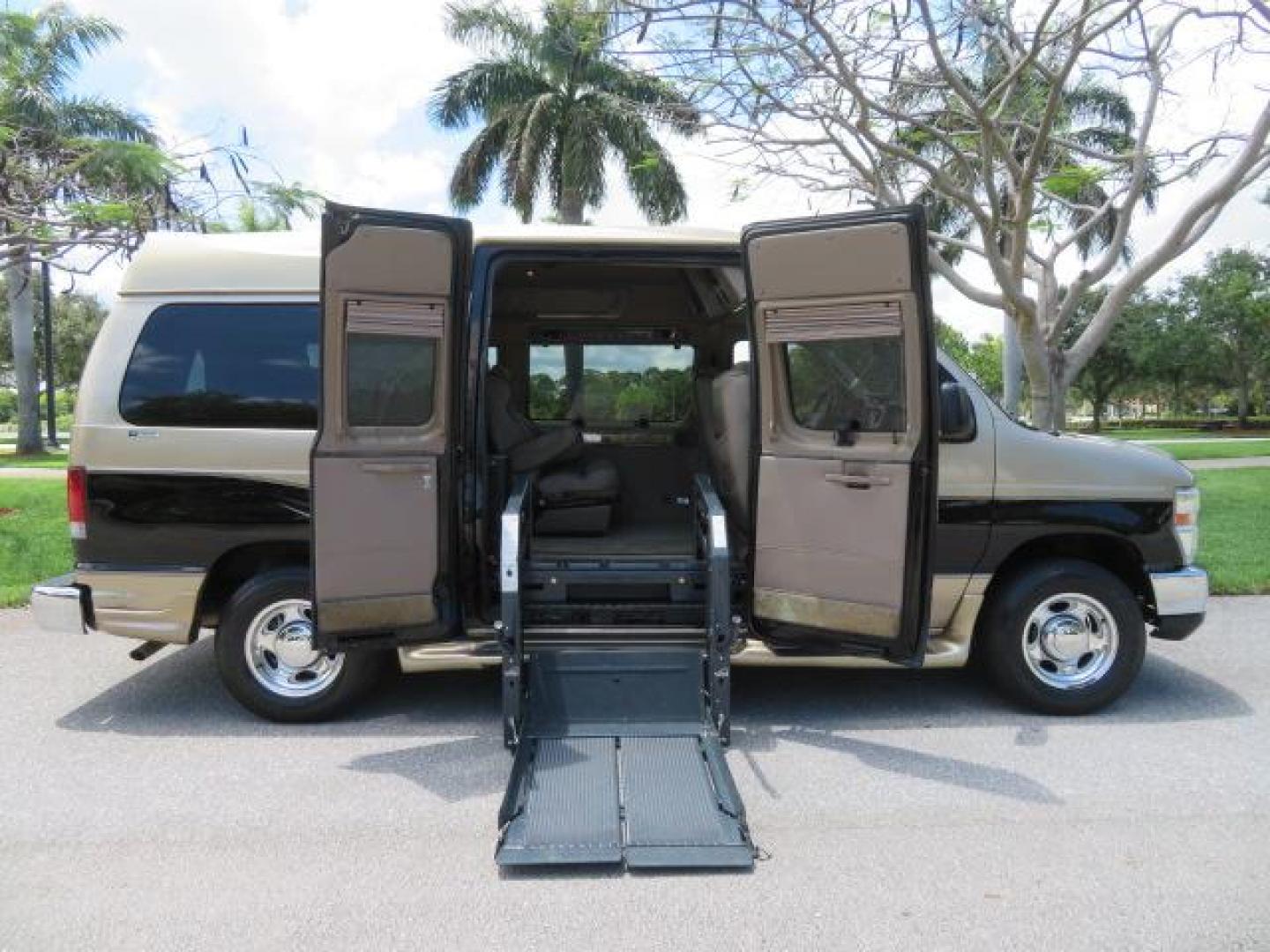 2010 Gold Ford Econoline Wagon E-150 (1FTNE1EL6AD) with an 5.4L V8 SOHC 16V engine, 4-Speed Automatic transmission, located at 4301 Oak Circle #19, Boca Raton, FL, 33431, (954) 561-2499, 26.388861, -80.084038 - You are looking at a Beautiful 2010 Ford Econoline Handicap Wheelchair Converison Van Tuscany VMI Conversion with 48K Original Miles, Ricon Side Entry Wheelchair Lift (the lift is almost brand new), 800lbs Capacity Lift, Raised Side Entry Doors, L Track Ratchet Tie-Downs in the floor, Factory Naviga - Photo#45