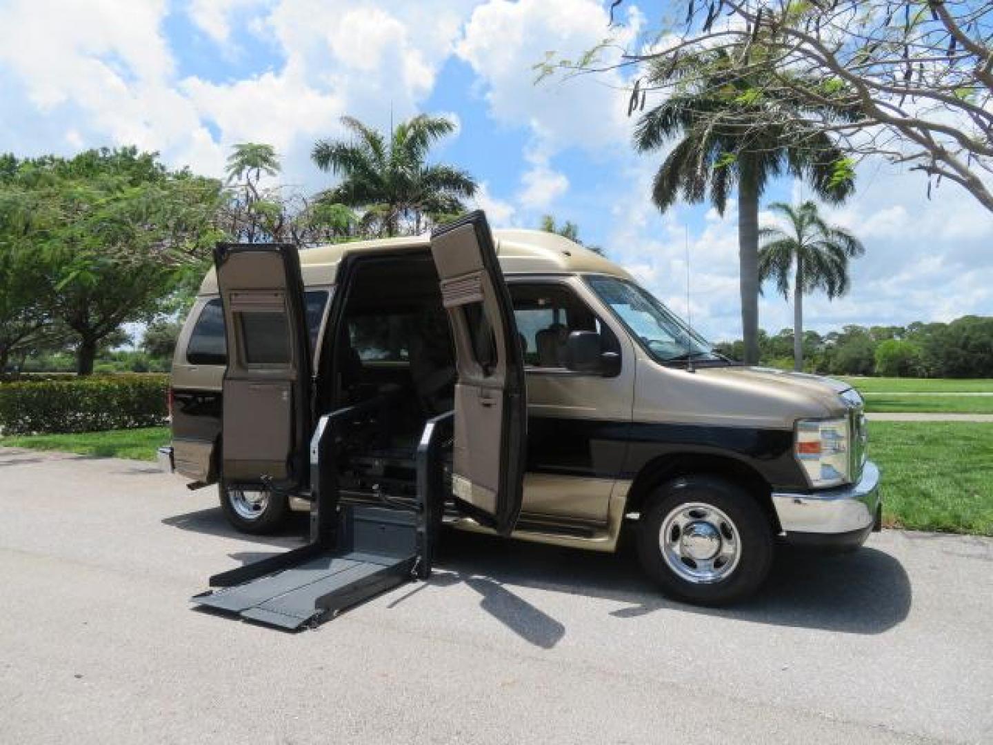 2010 Gold Ford Econoline Wagon E-150 (1FTNE1EL6AD) with an 5.4L V8 SOHC 16V engine, 4-Speed Automatic transmission, located at 4301 Oak Circle #19, Boca Raton, FL, 33431, (954) 561-2499, 26.388861, -80.084038 - You are looking at a Beautiful 2010 Ford Econoline Handicap Wheelchair Converison Van Tuscany VMI Conversion with 48K Original Miles, Ricon Side Entry Wheelchair Lift (the lift is almost brand new), 800lbs Capacity Lift, Raised Side Entry Doors, L Track Ratchet Tie-Downs in the floor, Factory Naviga - Photo#46