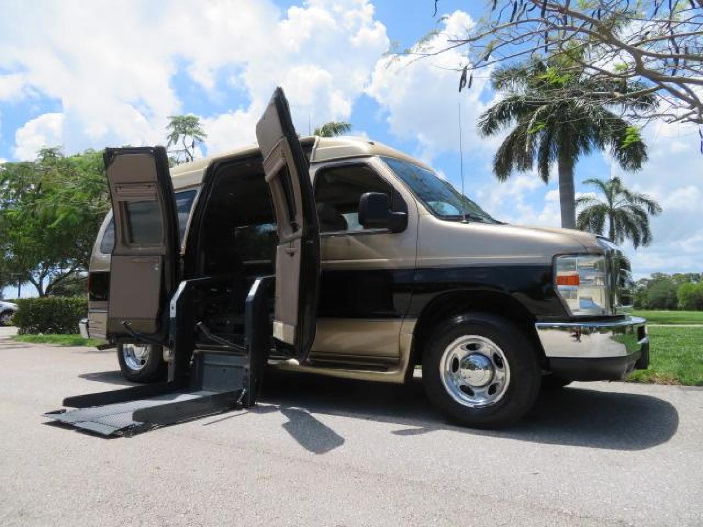 2010 Gold Ford Econoline Wagon E-150 (1FTNE1EL6AD) with an 5.4L V8 SOHC 16V engine, 4-Speed Automatic transmission, located at 4301 Oak Circle #19, Boca Raton, FL, 33431, (954) 561-2499, 26.388861, -80.084038 - You are looking at a Beautiful 2010 Ford Econoline Handicap Wheelchair Converison Van Tuscany VMI Conversion with 48K Original Miles, Ricon Side Entry Wheelchair Lift (the lift is almost brand new), 800lbs Capacity Lift, Raised Side Entry Doors, L Track Ratchet Tie-Downs in the floor, Factory Naviga - Photo#47