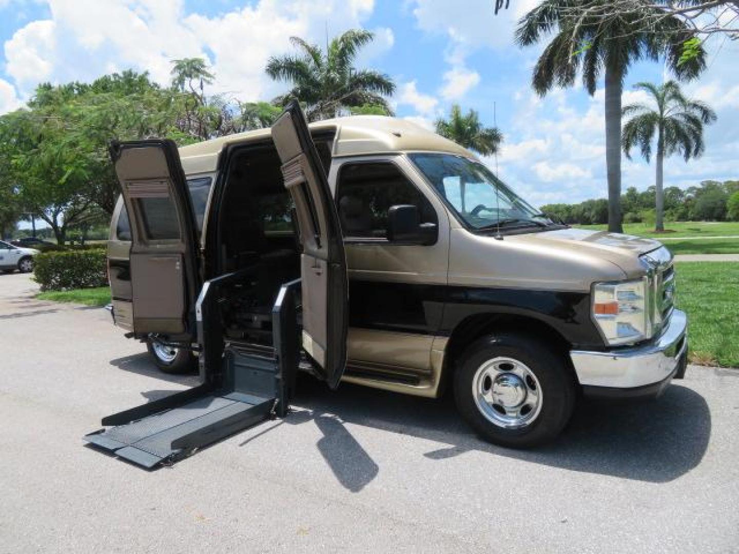 2010 Gold Ford Econoline Wagon E-150 (1FTNE1EL6AD) with an 5.4L V8 SOHC 16V engine, 4-Speed Automatic transmission, located at 4301 Oak Circle #19, Boca Raton, FL, 33431, (954) 561-2499, 26.388861, -80.084038 - You are looking at a Beautiful 2010 Ford Econoline Handicap Wheelchair Converison Van Tuscany VMI Conversion with 48K Original Miles, Ricon Side Entry Wheelchair Lift (the lift is almost brand new), 800lbs Capacity Lift, Raised Side Entry Doors, L Track Ratchet Tie-Downs in the floor, Factory Naviga - Photo#48