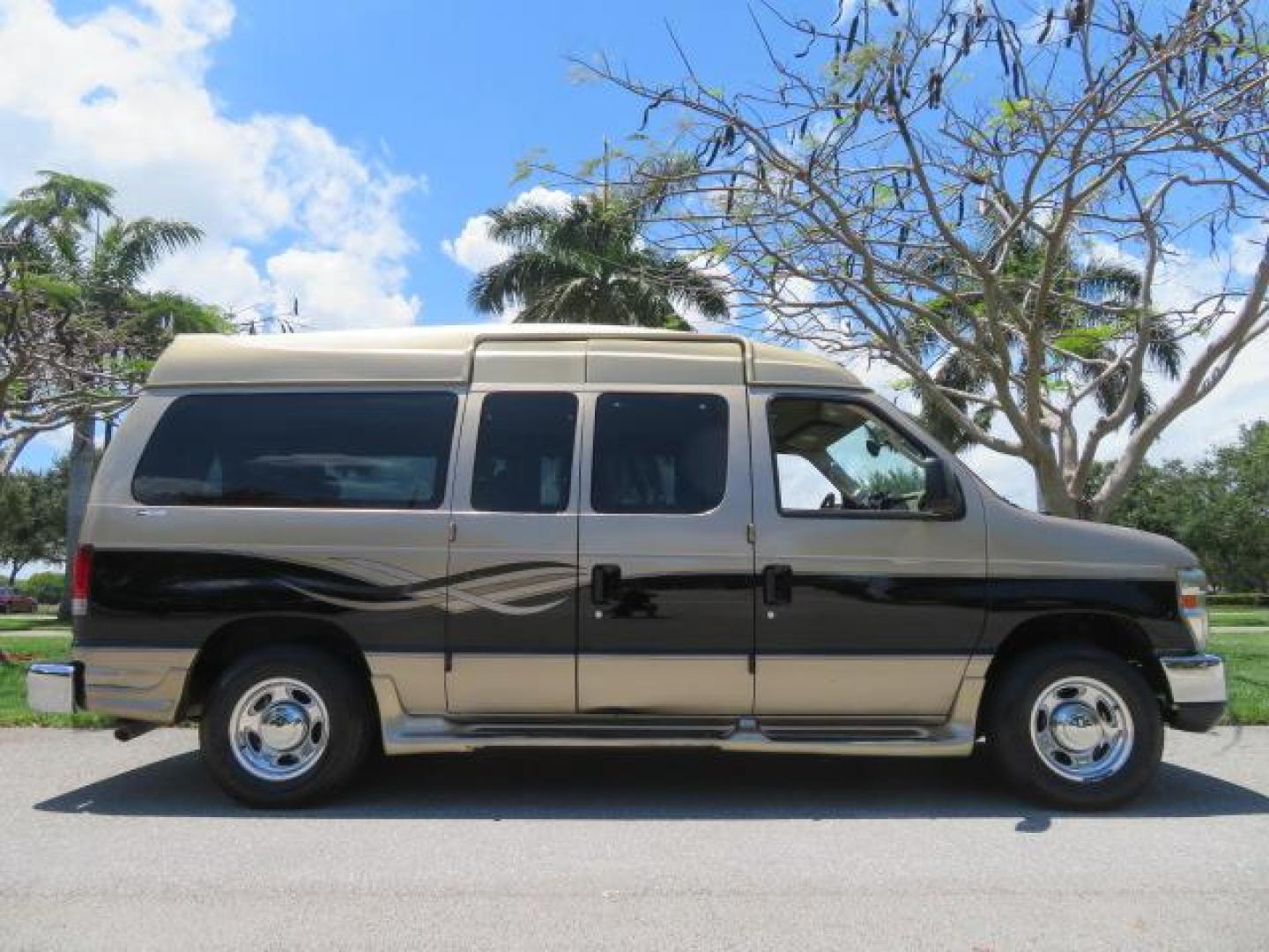 2010 Gold Ford Econoline Wagon E-150 (1FTNE1EL6AD) with an 5.4L V8 SOHC 16V engine, 4-Speed Automatic transmission, located at 4301 Oak Circle #19, Boca Raton, FL, 33431, (954) 561-2499, 26.388861, -80.084038 - You are looking at a Beautiful 2010 Ford Econoline Handicap Wheelchair Converison Van Tuscany VMI Conversion with 48K Original Miles, Ricon Side Entry Wheelchair Lift (the lift is almost brand new), 800lbs Capacity Lift, Raised Side Entry Doors, L Track Ratchet Tie-Downs in the floor, Factory Naviga - Photo#4