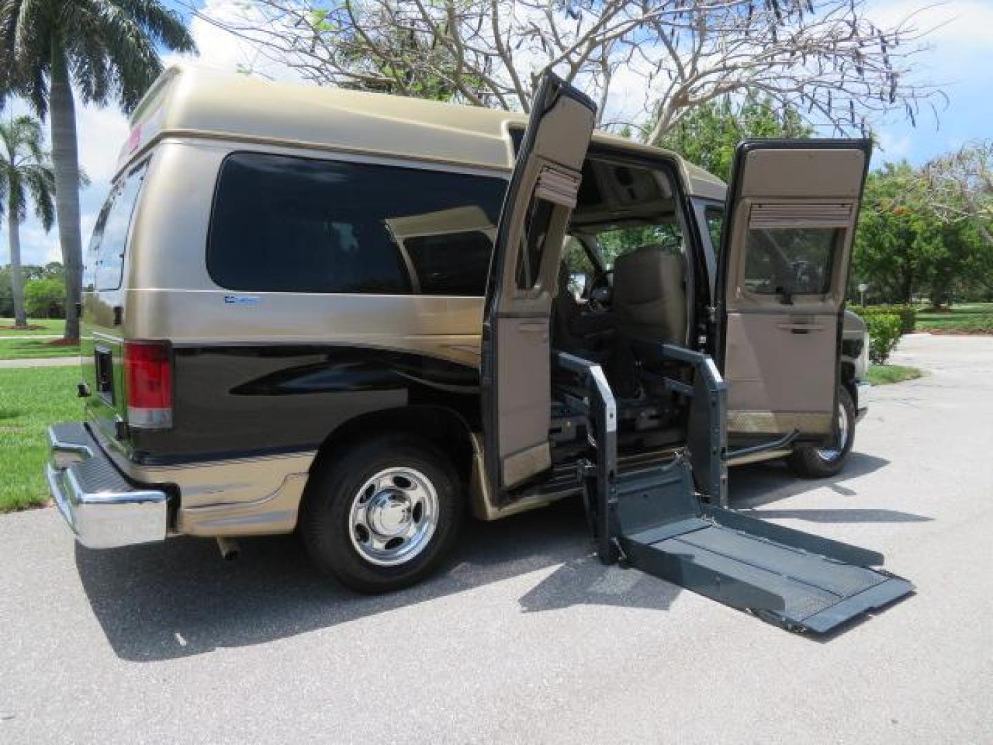 2010 Gold Ford Econoline Wagon E-150 (1FTNE1EL6AD) with an 5.4L V8 SOHC 16V engine, 4-Speed Automatic transmission, located at 4301 Oak Circle #19, Boca Raton, FL, 33431, (954) 561-2499, 26.388861, -80.084038 - You are looking at a Beautiful 2010 Ford Econoline Handicap Wheelchair Converison Van Tuscany VMI Conversion with 48K Original Miles, Ricon Side Entry Wheelchair Lift (the lift is almost brand new), 800lbs Capacity Lift, Raised Side Entry Doors, L Track Ratchet Tie-Downs in the floor, Factory Naviga - Photo#49