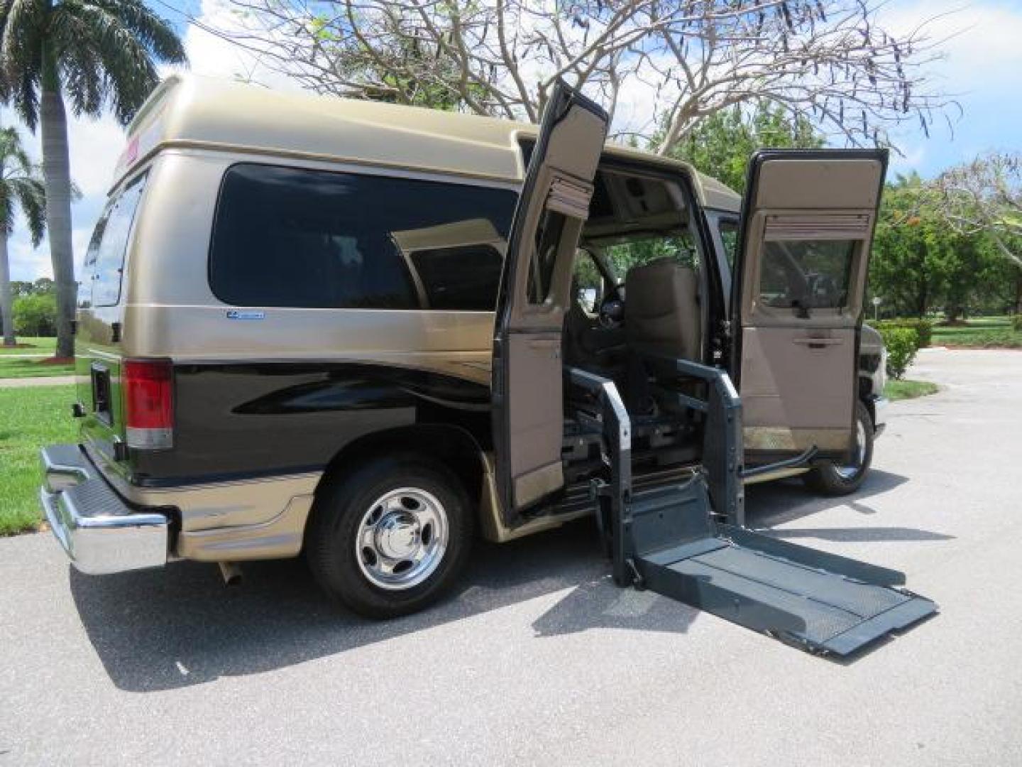 2010 Gold Ford Econoline Wagon E-150 (1FTNE1EL6AD) with an 5.4L V8 SOHC 16V engine, 4-Speed Automatic transmission, located at 4301 Oak Circle #19, Boca Raton, FL, 33431, (954) 561-2499, 26.388861, -80.084038 - You are looking at a Beautiful 2010 Ford Econoline Handicap Wheelchair Converison Van Tuscany VMI Conversion with 48K Original Miles, Ricon Side Entry Wheelchair Lift (the lift is almost brand new), 800lbs Capacity Lift, Raised Side Entry Doors, L Track Ratchet Tie-Downs in the floor, Factory Naviga - Photo#50