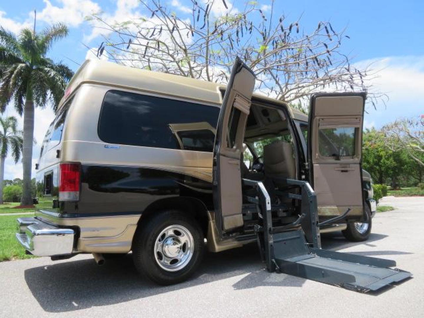 2010 Gold Ford Econoline Wagon E-150 (1FTNE1EL6AD) with an 5.4L V8 SOHC 16V engine, 4-Speed Automatic transmission, located at 4301 Oak Circle #19, Boca Raton, FL, 33431, (954) 561-2499, 26.388861, -80.084038 - You are looking at a Beautiful 2010 Ford Econoline Handicap Wheelchair Converison Van Tuscany VMI Conversion with 48K Original Miles, Ricon Side Entry Wheelchair Lift (the lift is almost brand new), 800lbs Capacity Lift, Raised Side Entry Doors, L Track Ratchet Tie-Downs in the floor, Factory Naviga - Photo#51