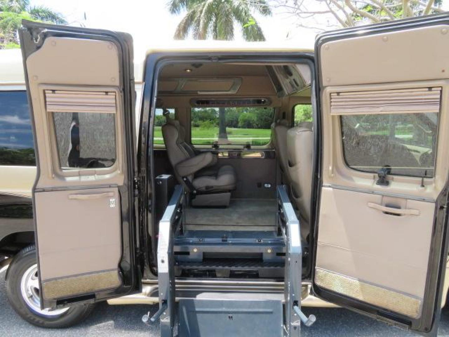 2010 Gold Ford Econoline Wagon E-150 (1FTNE1EL6AD) with an 5.4L V8 SOHC 16V engine, 4-Speed Automatic transmission, located at 4301 Oak Circle #19, Boca Raton, FL, 33431, (954) 561-2499, 26.388861, -80.084038 - You are looking at a Beautiful 2010 Ford Econoline Handicap Wheelchair Converison Van Tuscany VMI Conversion with 48K Original Miles, Ricon Side Entry Wheelchair Lift (the lift is almost brand new), 800lbs Capacity Lift, Raised Side Entry Doors, L Track Ratchet Tie-Downs in the floor, Factory Naviga - Photo#52