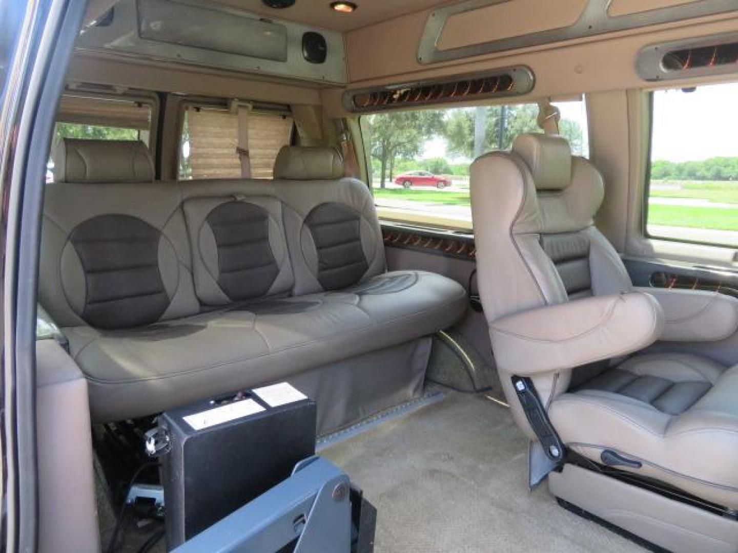 2010 Gold Ford Econoline Wagon E-150 (1FTNE1EL6AD) with an 5.4L V8 SOHC 16V engine, 4-Speed Automatic transmission, located at 4301 Oak Circle #19, Boca Raton, FL, 33431, (954) 561-2499, 26.388861, -80.084038 - You are looking at a Beautiful 2010 Ford Econoline Handicap Wheelchair Converison Van Tuscany VMI Conversion with 48K Original Miles, Ricon Side Entry Wheelchair Lift (the lift is almost brand new), 800lbs Capacity Lift, Raised Side Entry Doors, L Track Ratchet Tie-Downs in the floor, Factory Naviga - Photo#55