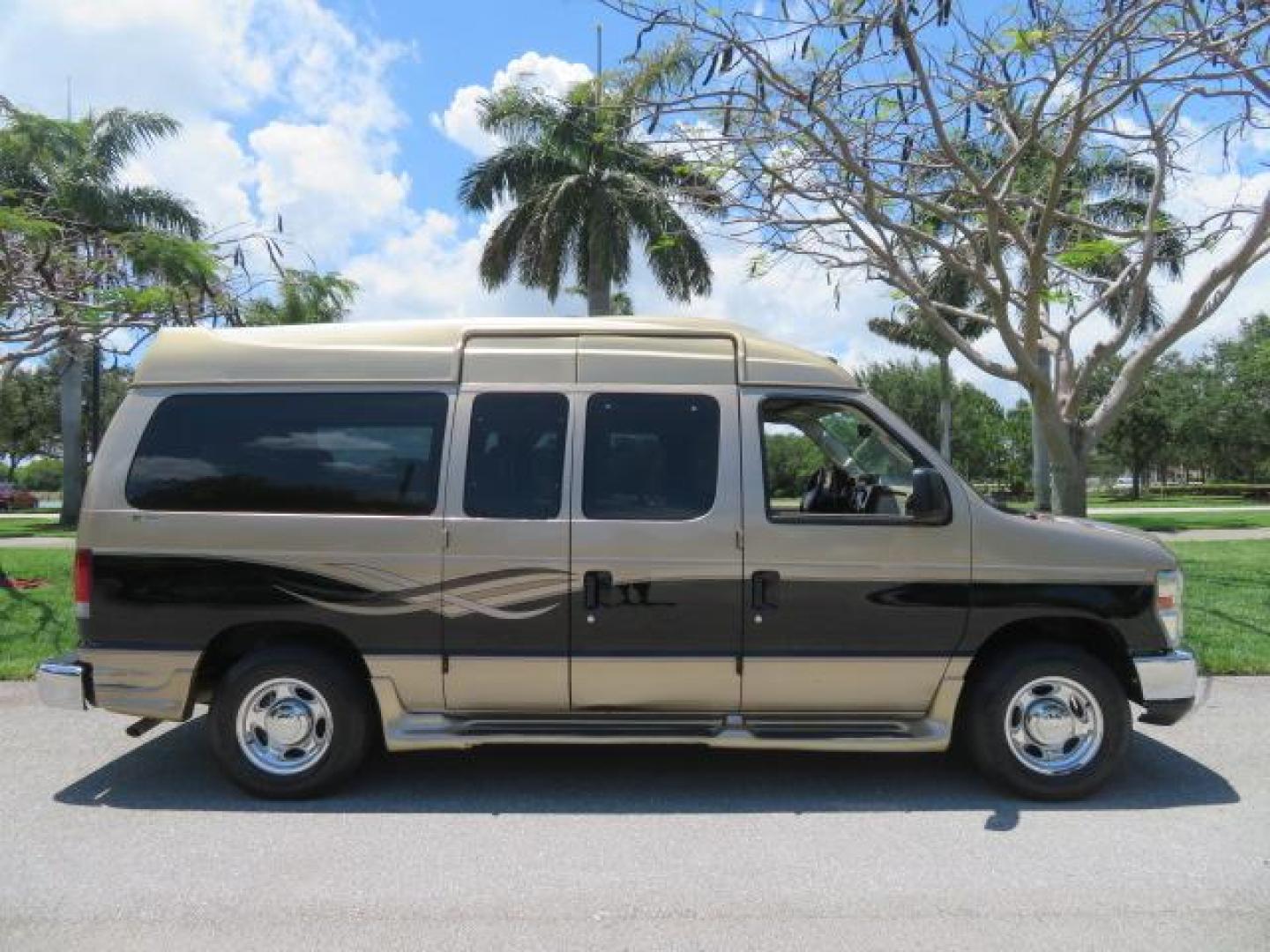 2010 Gold Ford Econoline Wagon E-150 (1FTNE1EL6AD) with an 5.4L V8 SOHC 16V engine, 4-Speed Automatic transmission, located at 4301 Oak Circle #19, Boca Raton, FL, 33431, (954) 561-2499, 26.388861, -80.084038 - You are looking at a Beautiful 2010 Ford Econoline Handicap Wheelchair Converison Van Tuscany VMI Conversion with 48K Original Miles, Ricon Side Entry Wheelchair Lift (the lift is almost brand new), 800lbs Capacity Lift, Raised Side Entry Doors, L Track Ratchet Tie-Downs in the floor, Factory Naviga - Photo#6