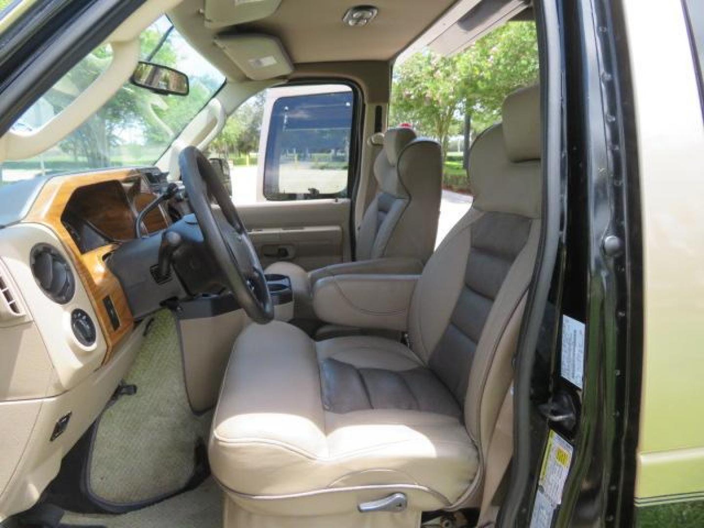 2010 Gold Ford Econoline Wagon E-150 (1FTNE1EL6AD) with an 5.4L V8 SOHC 16V engine, 4-Speed Automatic transmission, located at 4301 Oak Circle #19, Boca Raton, FL, 33431, (954) 561-2499, 26.388861, -80.084038 - You are looking at a Beautiful 2010 Ford Econoline Handicap Wheelchair Converison Van Tuscany VMI Conversion with 48K Original Miles, Ricon Side Entry Wheelchair Lift (the lift is almost brand new), 800lbs Capacity Lift, Raised Side Entry Doors, L Track Ratchet Tie-Downs in the floor, Factory Naviga - Photo#74