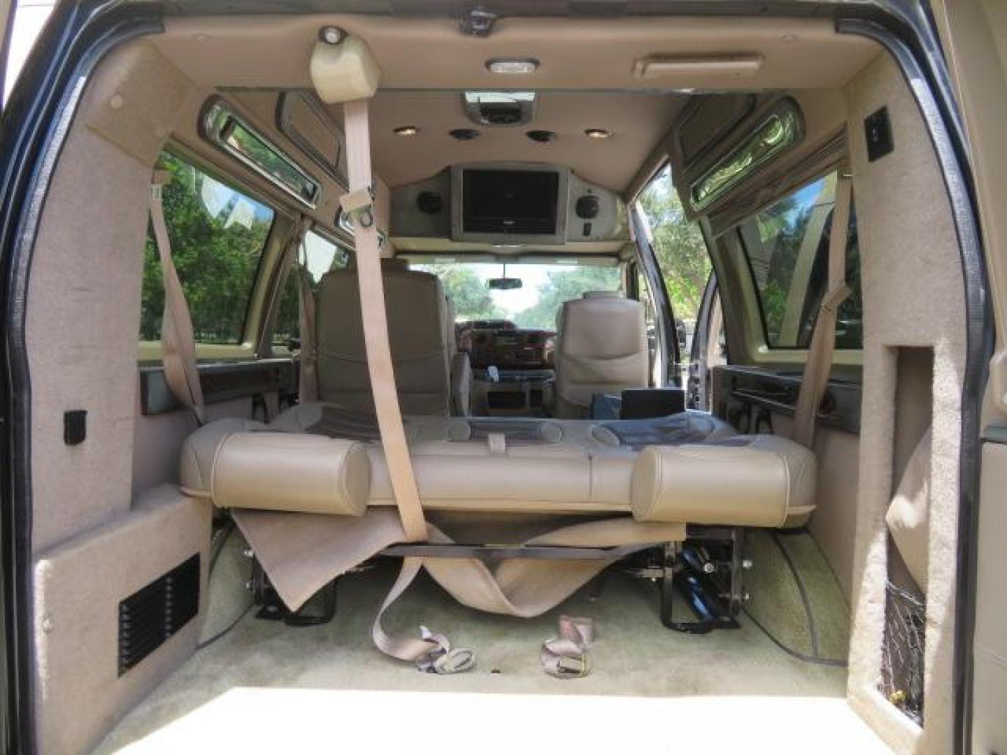 2010 Gold Ford Econoline Wagon E-150 (1FTNE1EL6AD) with an 5.4L V8 SOHC 16V engine, 4-Speed Automatic transmission, located at 4301 Oak Circle #19, Boca Raton, FL, 33431, (954) 561-2499, 26.388861, -80.084038 - You are looking at a Beautiful 2010 Ford Econoline Handicap Wheelchair Converison Van Tuscany VMI Conversion with 48K Original Miles, Ricon Side Entry Wheelchair Lift (the lift is almost brand new), 800lbs Capacity Lift, Raised Side Entry Doors, L Track Ratchet Tie-Downs in the floor, Factory Naviga - Photo#79