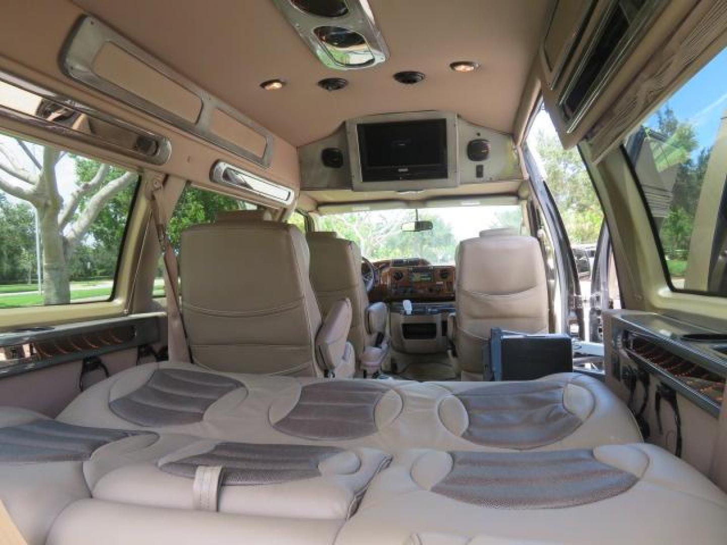 2010 Gold Ford Econoline Wagon E-150 (1FTNE1EL6AD) with an 5.4L V8 SOHC 16V engine, 4-Speed Automatic transmission, located at 4301 Oak Circle #19, Boca Raton, FL, 33431, (954) 561-2499, 26.388861, -80.084038 - You are looking at a Beautiful 2010 Ford Econoline Handicap Wheelchair Converison Van Tuscany VMI Conversion with 48K Original Miles, Ricon Side Entry Wheelchair Lift (the lift is almost brand new), 800lbs Capacity Lift, Raised Side Entry Doors, L Track Ratchet Tie-Downs in the floor, Factory Naviga - Photo#80