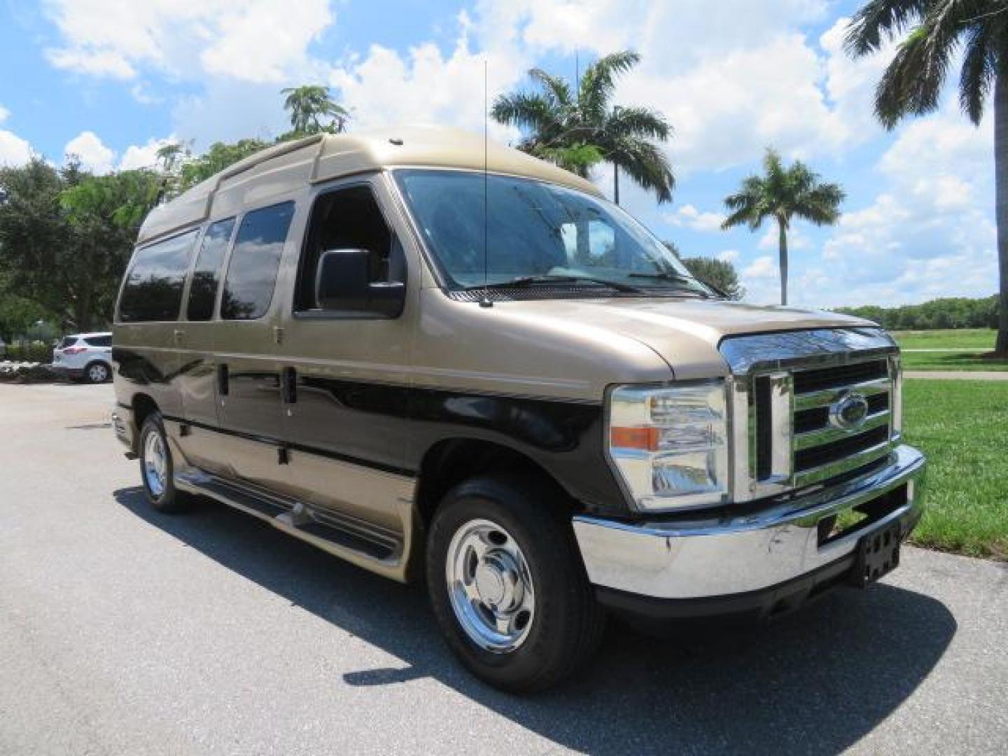 2010 Gold Ford Econoline Wagon E-150 (1FTNE1EL6AD) with an 5.4L V8 SOHC 16V engine, 4-Speed Automatic transmission, located at 4301 Oak Circle #19, Boca Raton, FL, 33431, (954) 561-2499, 26.388861, -80.084038 - You are looking at a Beautiful 2010 Ford Econoline Handicap Wheelchair Converison Van Tuscany VMI Conversion with 48K Original Miles, Ricon Side Entry Wheelchair Lift (the lift is almost brand new), 800lbs Capacity Lift, Raised Side Entry Doors, L Track Ratchet Tie-Downs in the floor, Factory Naviga - Photo#8