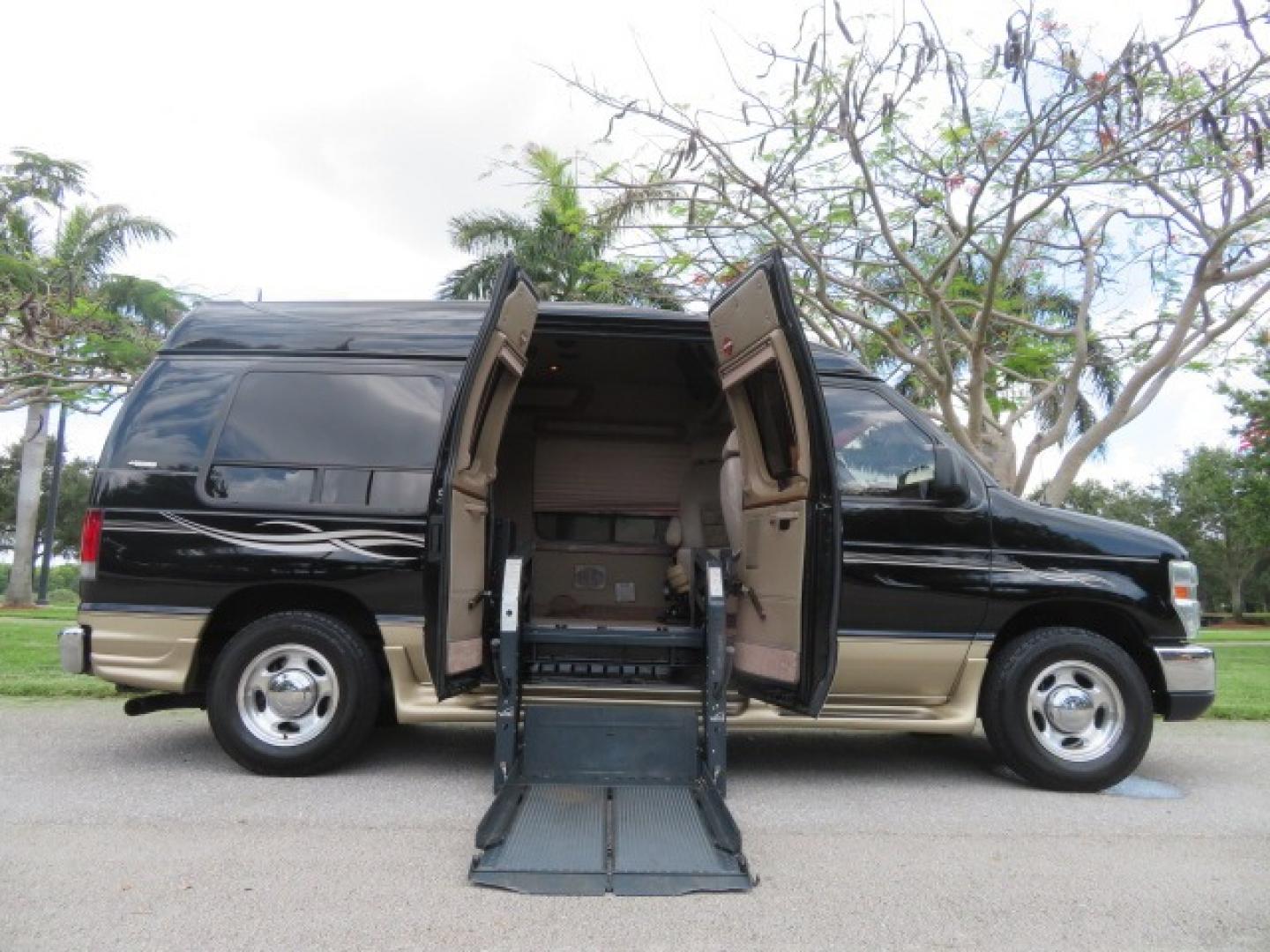 2013 Black Ford E-Series Van E-150 (1FDNE1EL6DD) with an 5.4L V8 SOHC 16V FFV engine, 4-Speed Automatic transmission, located at 4301 Oak Circle #19, Boca Raton, FL, 33431, (954) 561-2499, 26.388861, -80.084038 - Photo#0