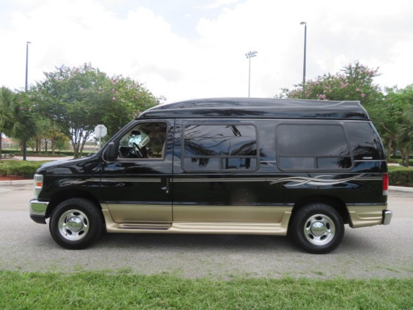 2013 Black Ford E-Series Van E-150 (1FDNE1EL6DD) with an 5.4L V8 SOHC 16V FFV engine, 4-Speed Automatic transmission, located at 4301 Oak Circle #19, Boca Raton, FL, 33431, (954) 561-2499, 26.388861, -80.084038 - Photo#14