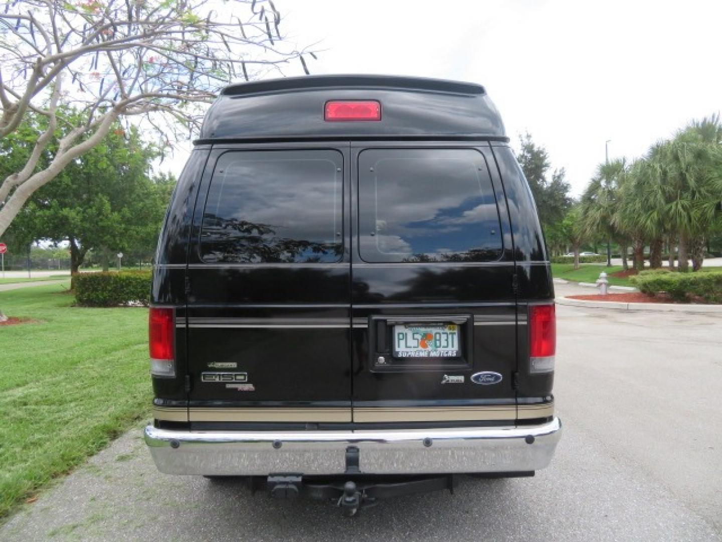 2013 Black Ford E-Series Van E-150 (1FDNE1EL6DD) with an 5.4L V8 SOHC 16V FFV engine, 4-Speed Automatic transmission, located at 4301 Oak Circle #19, Boca Raton, FL, 33431, (954) 561-2499, 26.388861, -80.084038 - Photo#16