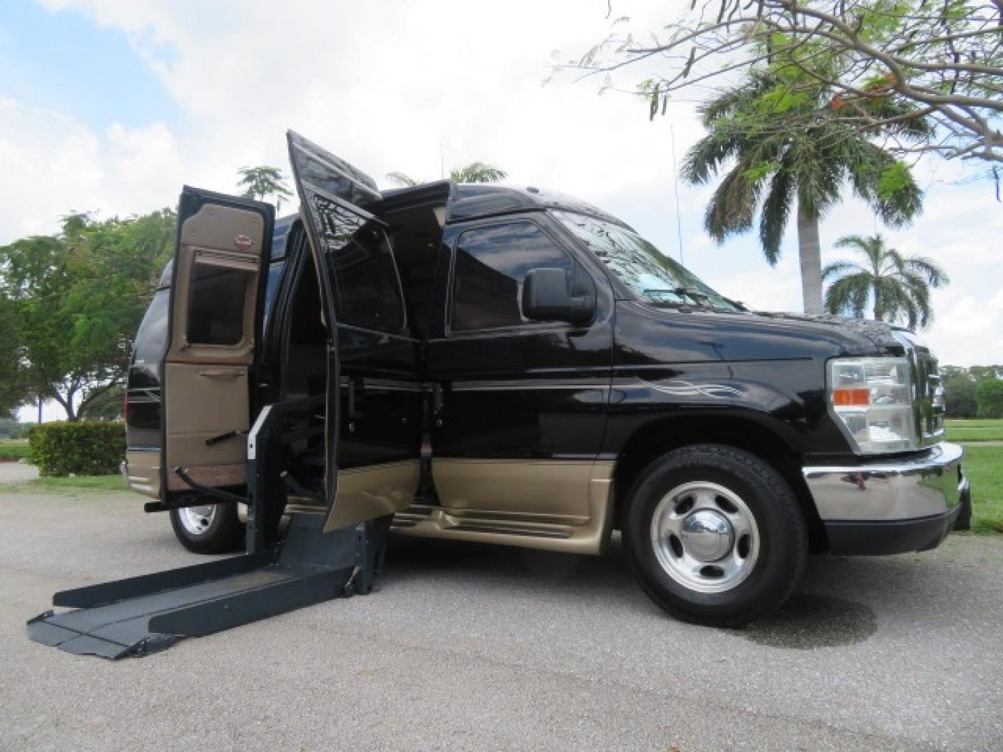 2013 Black Ford E-Series Van E-150 (1FDNE1EL6DD) with an 5.4L V8 SOHC 16V FFV engine, 4-Speed Automatic transmission, located at 4301 Oak Circle #19, Boca Raton, FL, 33431, (954) 561-2499, 26.388861, -80.084038 - Photo#1