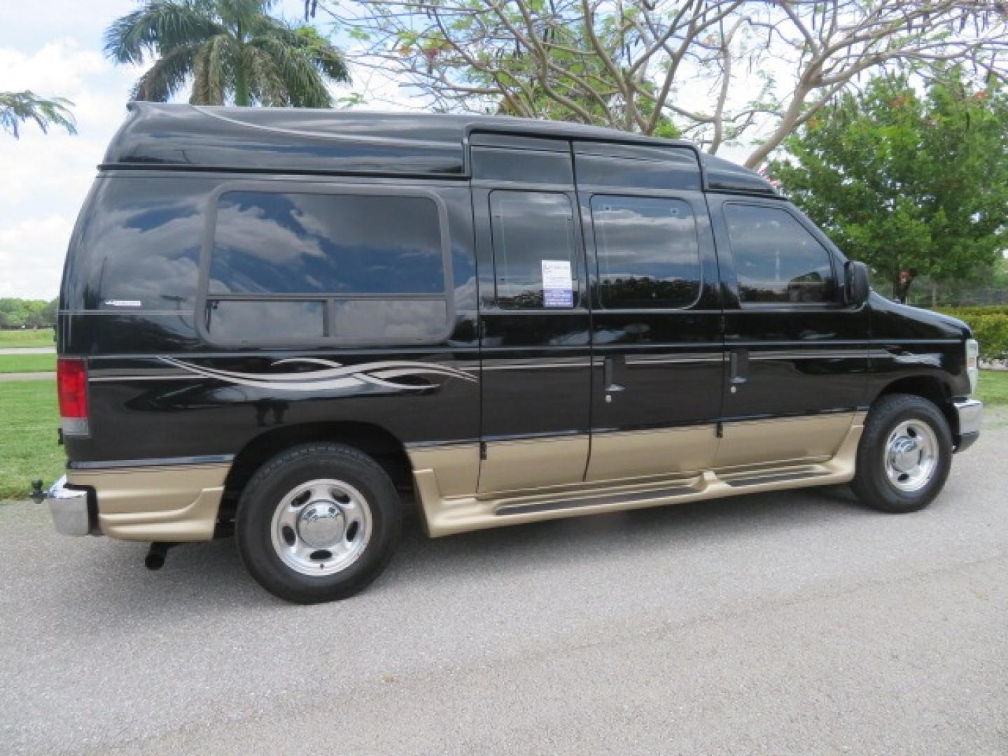 2013 Black Ford E-Series Van E-150 (1FDNE1EL6DD) with an 5.4L V8 SOHC 16V FFV engine, 4-Speed Automatic transmission, located at 4301 Oak Circle #19, Boca Raton, FL, 33431, (954) 561-2499, 26.388861, -80.084038 - Photo#19