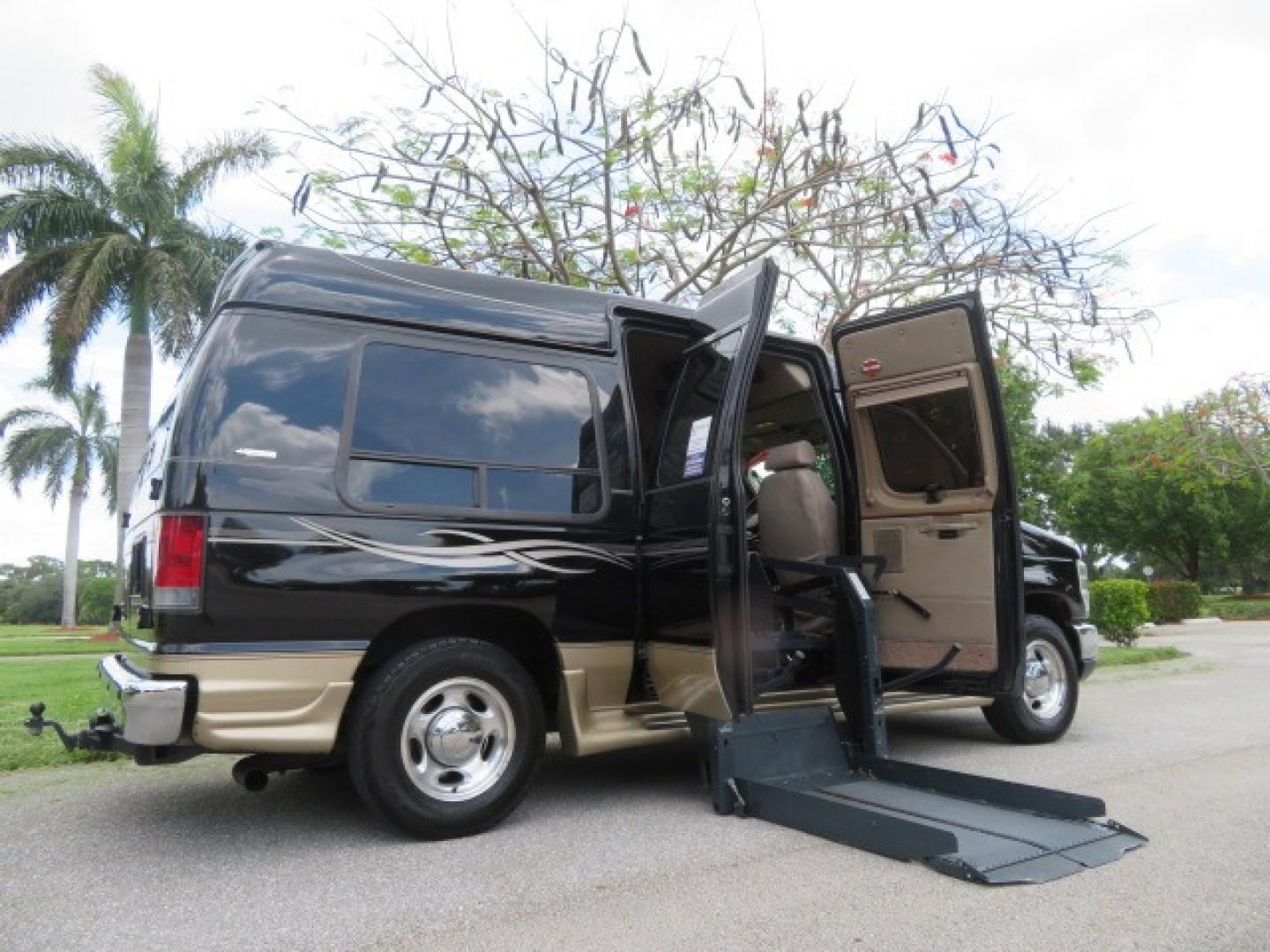 2013 Black Ford E-Series Van E-150 (1FDNE1EL6DD) with an 5.4L V8 SOHC 16V FFV engine, 4-Speed Automatic transmission, located at 4301 Oak Circle #19, Boca Raton, FL, 33431, (954) 561-2499, 26.388861, -80.084038 - Photo#2