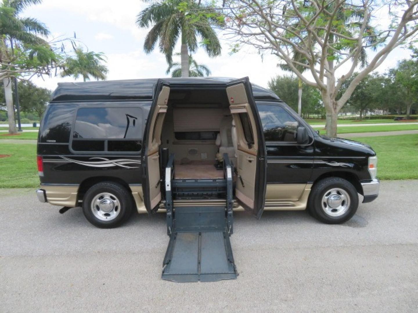 2013 Black Ford E-Series Van E-150 (1FDNE1EL6DD) with an 5.4L V8 SOHC 16V FFV engine, 4-Speed Automatic transmission, located at 4301 Oak Circle #19, Boca Raton, FL, 33431, (954) 561-2499, 26.388861, -80.084038 - Photo#52