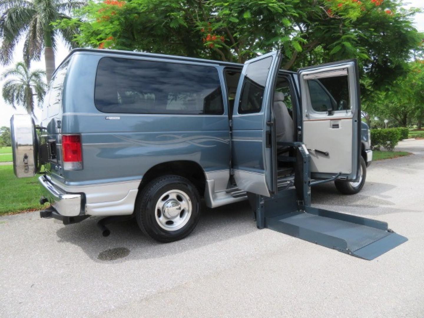 2012 Dark Blue Ford E-Series Van E-150 (1FTNE1EL9CD) with an 5.4L V8 SOHC 16V FFV engine, 4-Speed Automatic transmission, located at 4301 Oak Circle #19, Boca Raton, FL, 33431, (954) 561-2499, 26.388861, -80.084038 - Photo#2