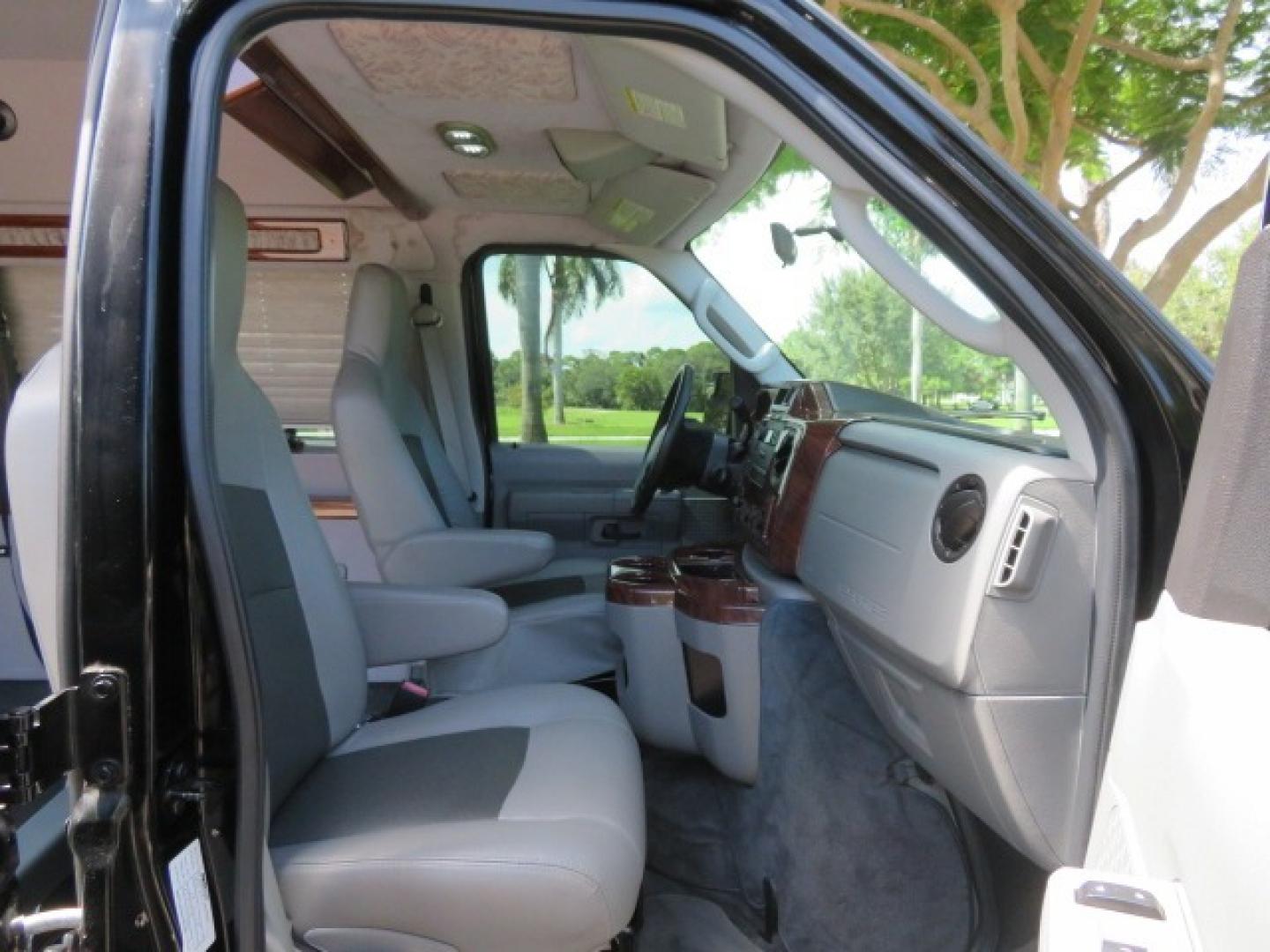 2014 Black Ford E-Series Van E-250 Extended (1FTNS2ELXED) with an 5.4L V8 SOHC 16V FFV engine, 4-Speed Automatic transmission, located at 4301 Oak Circle #19, Boca Raton, FL, 33431, (954) 561-2499, 26.388861, -80.084038 - You are looking at a Gorgeous Black 2014 Ford Econoline E250 Extended Handicap Wheelchair Conversion Van with 21K Original Miles and Fully Loaded with all the options including: Avenger Conversion Package, Ricon Slide Away 600LB Side Entry Wheelchair Lift, Lowered Floor, Expanded Side Entry Doors, P - Photo#102