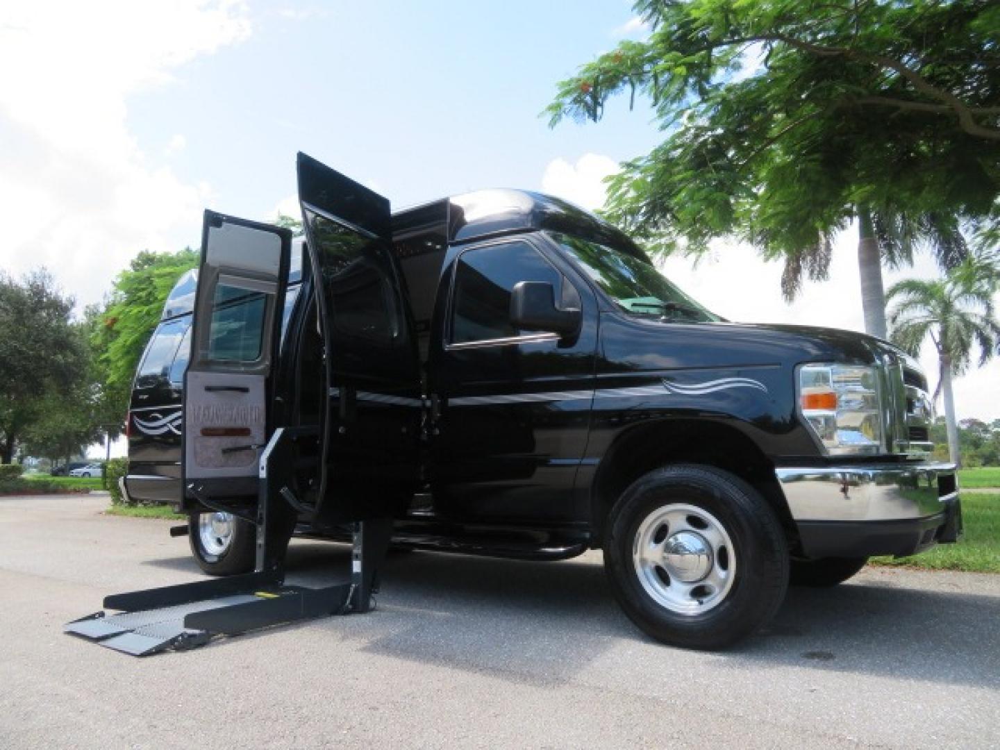 2014 Black Ford E-Series Van E-250 Extended (1FTNS2ELXED) with an 5.4L V8 SOHC 16V FFV engine, 4-Speed Automatic transmission, located at 4301 Oak Circle #19, Boca Raton, FL, 33431, (954) 561-2499, 26.388861, -80.084038 - You are looking at a Gorgeous Black 2014 Ford Econoline E250 Extended Handicap Wheelchair Conversion Van with 21K Original Miles and Fully Loaded with all the options including: Avenger Conversion Package, Ricon Slide Away 600LB Side Entry Wheelchair Lift, Lowered Floor, Expanded Side Entry Doors, P - Photo#1