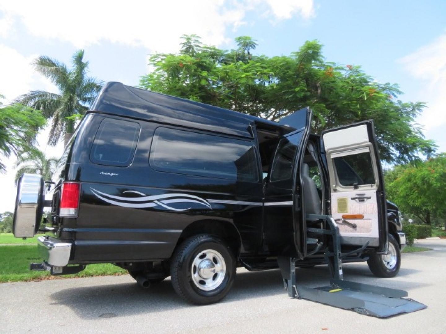 2014 Black Ford E-Series Van E-250 Extended (1FTNS2ELXED) with an 5.4L V8 SOHC 16V FFV engine, 4-Speed Automatic transmission, located at 4301 Oak Circle #19, Boca Raton, FL, 33431, (954) 561-2499, 26.388861, -80.084038 - You are looking at a Gorgeous Black 2014 Ford Econoline E250 Extended Handicap Wheelchair Conversion Van with 21K Original Miles and Fully Loaded with all the options including: Avenger Conversion Package, Ricon Slide Away 600LB Side Entry Wheelchair Lift, Lowered Floor, Expanded Side Entry Doors, P - Photo#2