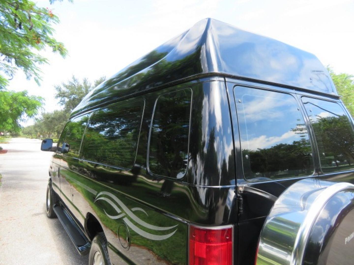 2014 Black Ford E-Series Van E-250 Extended (1FTNS2ELXED) with an 5.4L V8 SOHC 16V FFV engine, 4-Speed Automatic transmission, located at 4301 Oak Circle #19, Boca Raton, FL, 33431, (954) 561-2499, 26.388861, -80.084038 - You are looking at a Gorgeous Black 2014 Ford Econoline E250 Extended Handicap Wheelchair Conversion Van with 21K Original Miles and Fully Loaded with all the options including: Avenger Conversion Package, Ricon Slide Away 600LB Side Entry Wheelchair Lift, Lowered Floor, Expanded Side Entry Doors, P - Photo#35